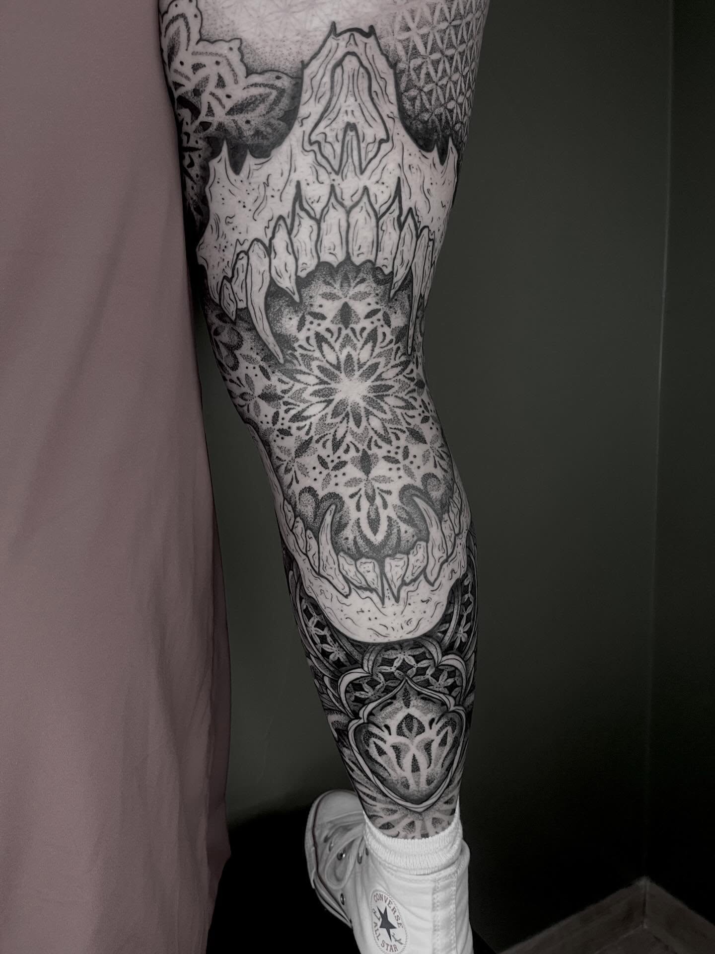 Skull geometric tattoo on the leg by Destiny Tolman