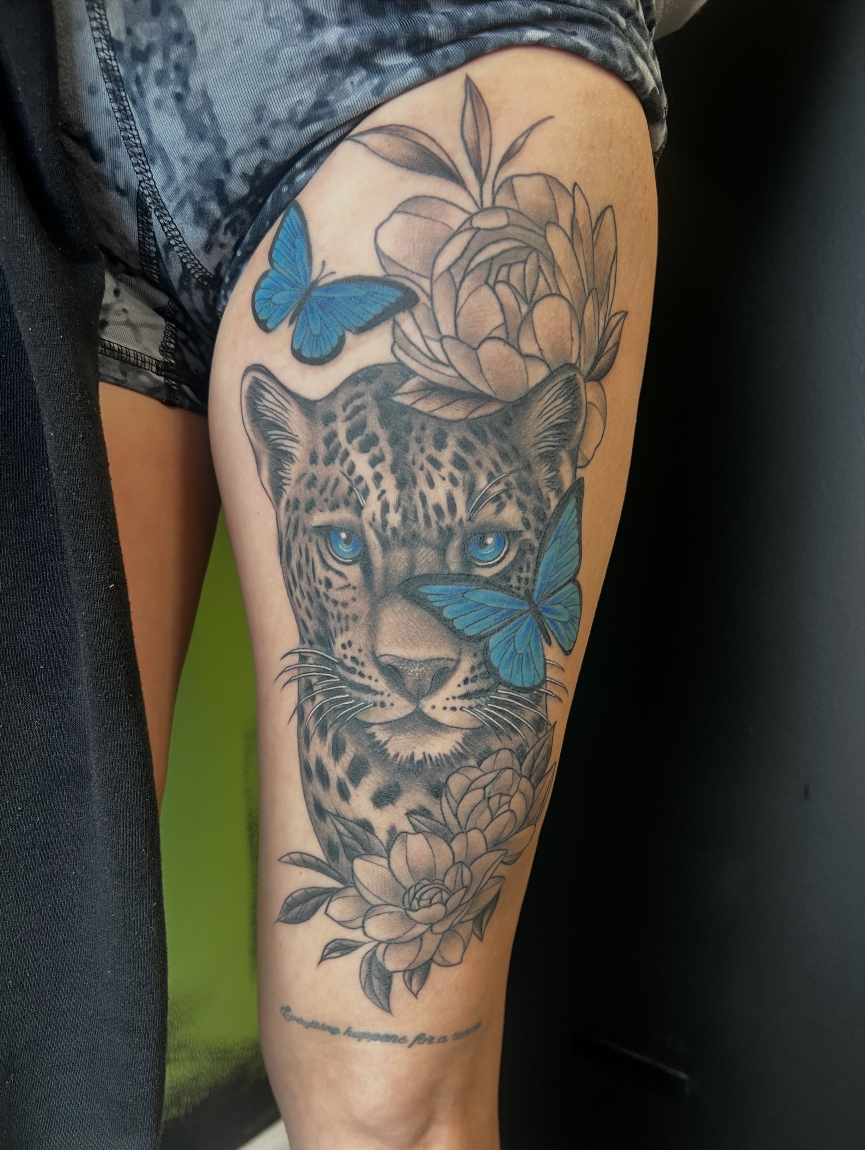 Jaguar with butterflies realism tattoo on the thigh by Olivia Suzanne Fada