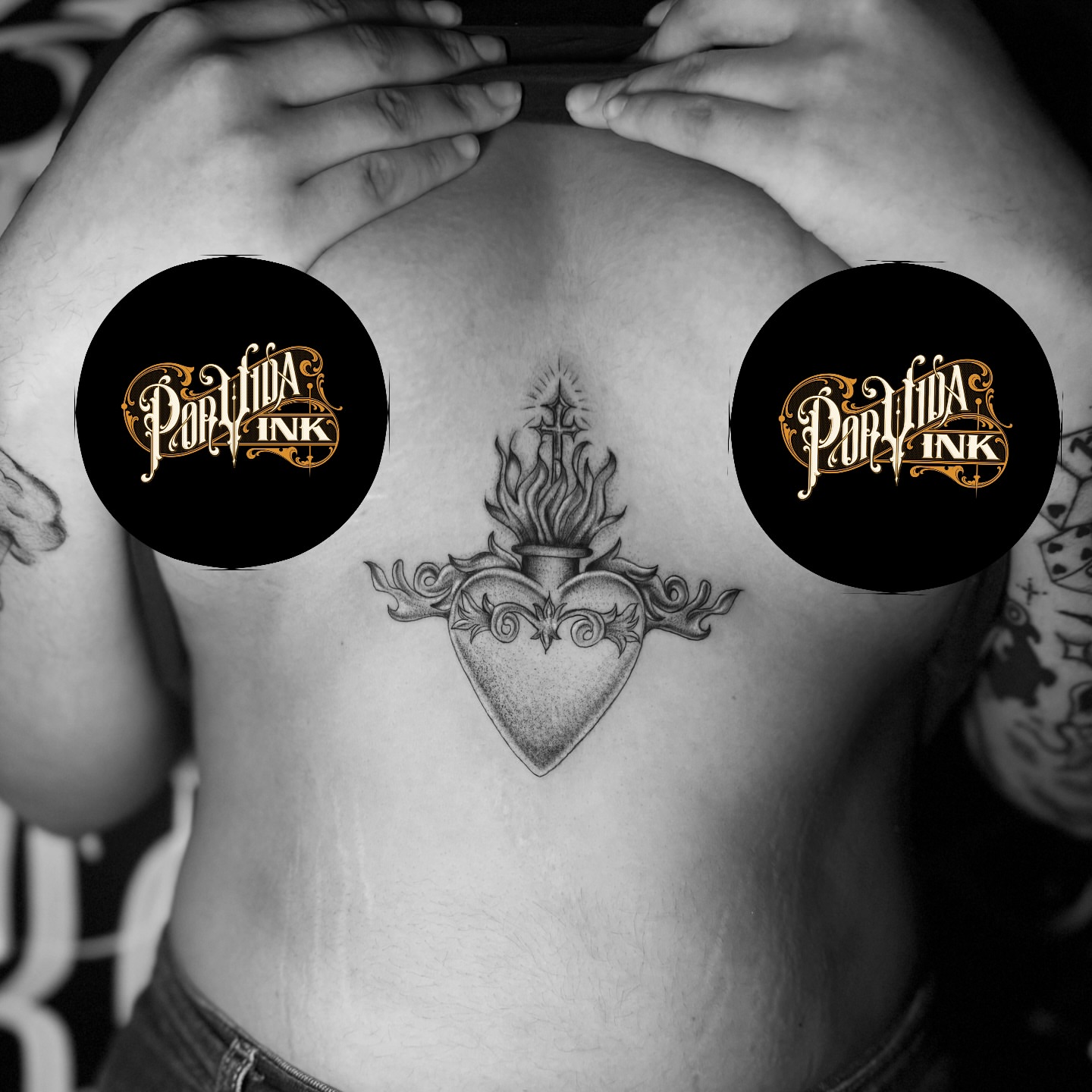 Heart with flame black and grey tattoo on the chest by Giana Martinez, Wichita, Kansas