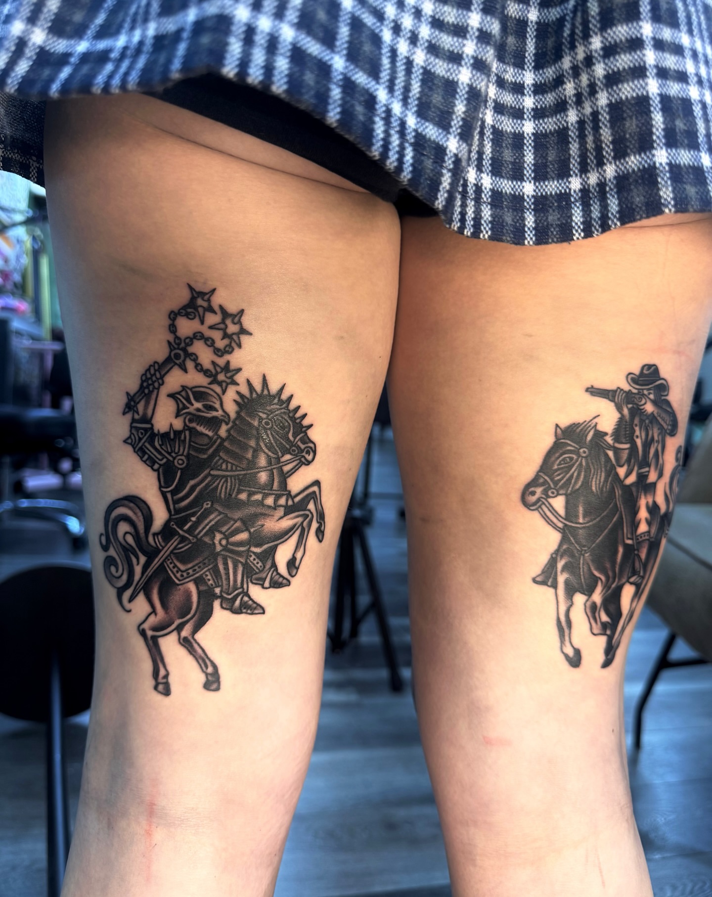 Horse and rider black and grey tattoo on the thigh by Suda
