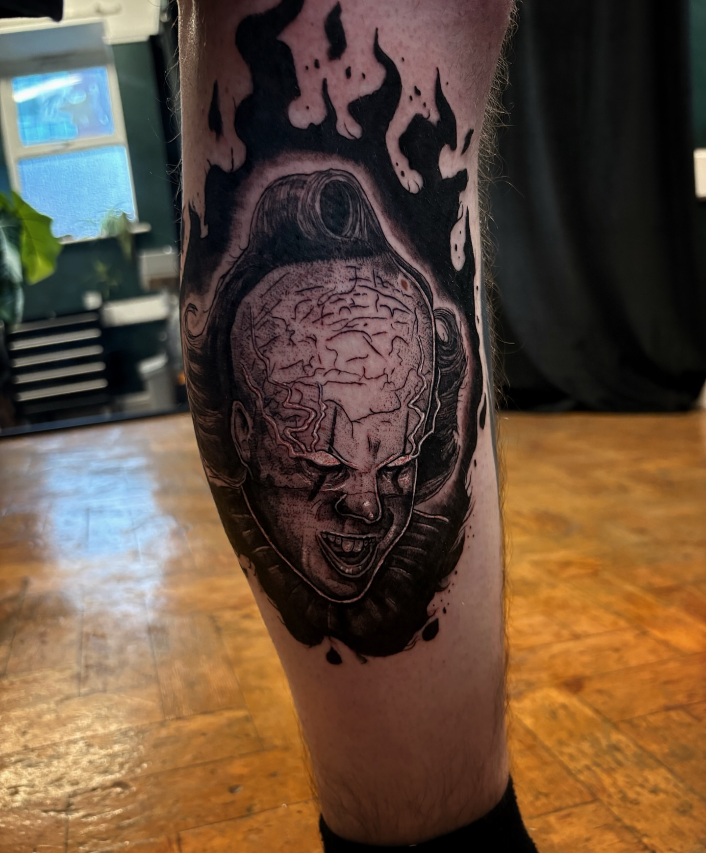 Tattoo by @scorchedbones_ — black_and_grey, realism