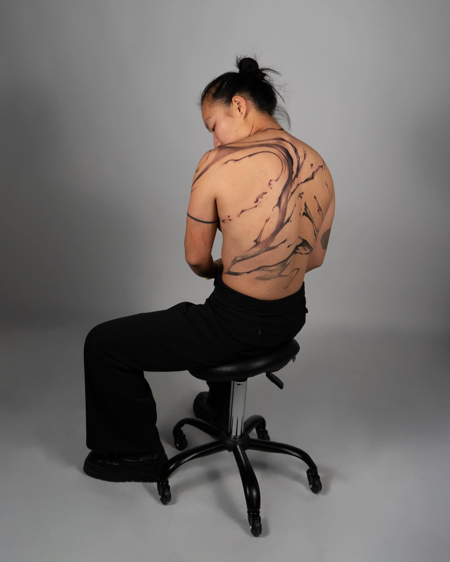 Abstract branches black and grey tattoo on the back by Pietro Moleti