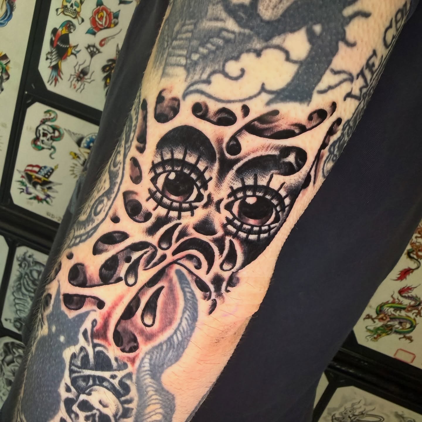 Sugar skull Chicano tattoo on the forearm by Mike Dunn