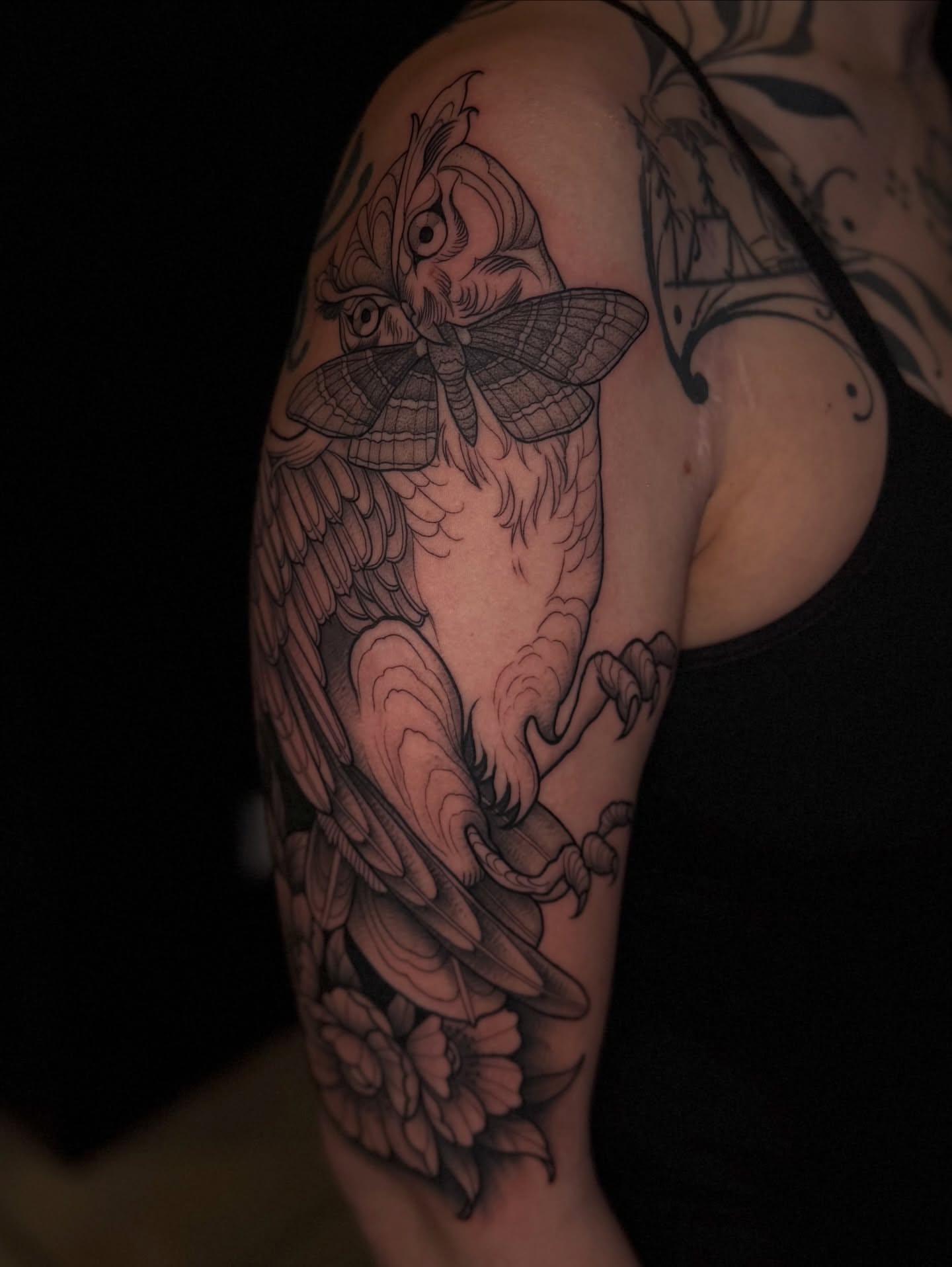 Owl and moth American traditional tattoo on the shoulder by Lou @ Ethereal Tattoo