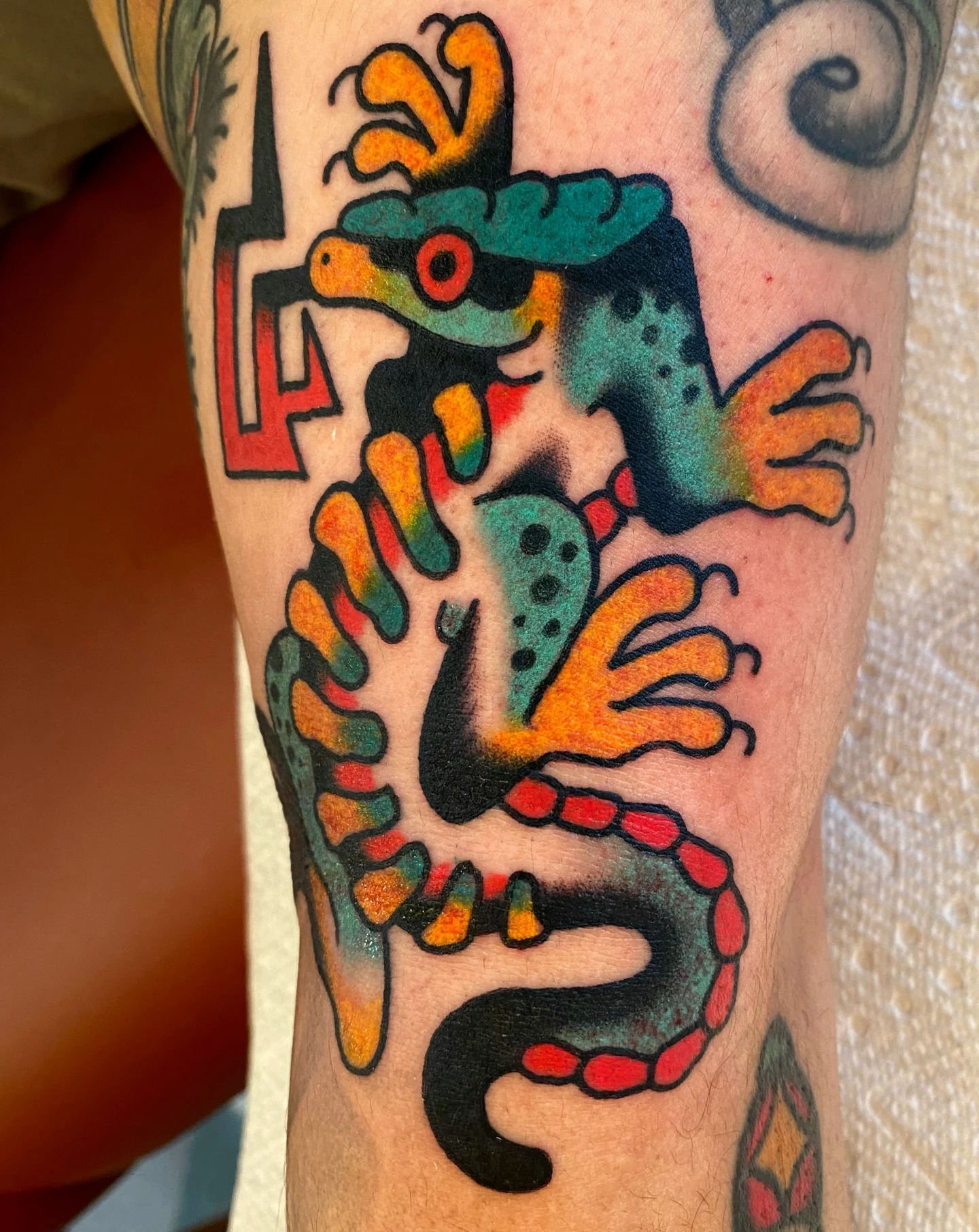Lizard Chicano tattoo on the forearm by Quinn, Kansas City, Missouri