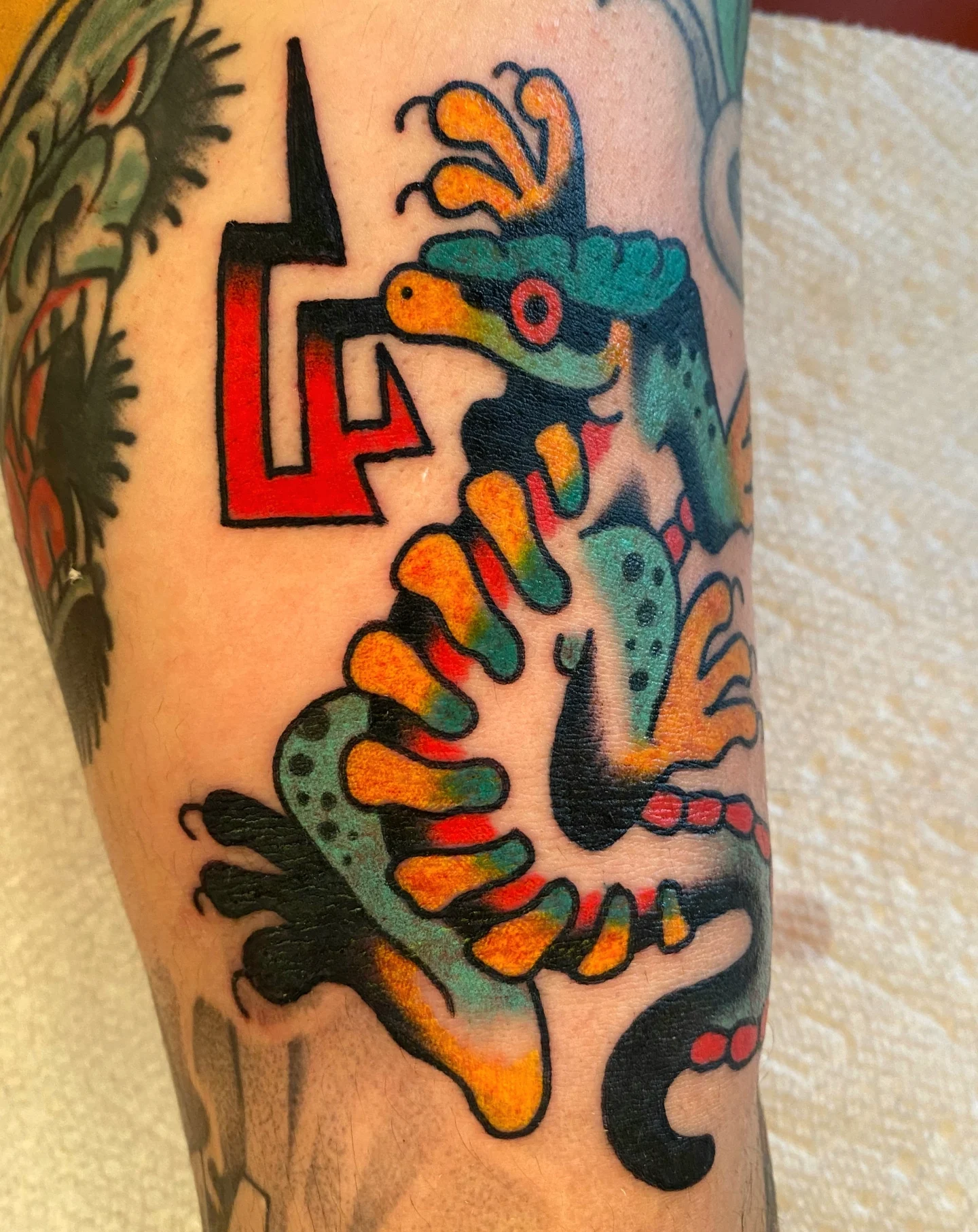 Gecko American traditional tattoo on the forearm by Quinn, Kansas City, Missouri