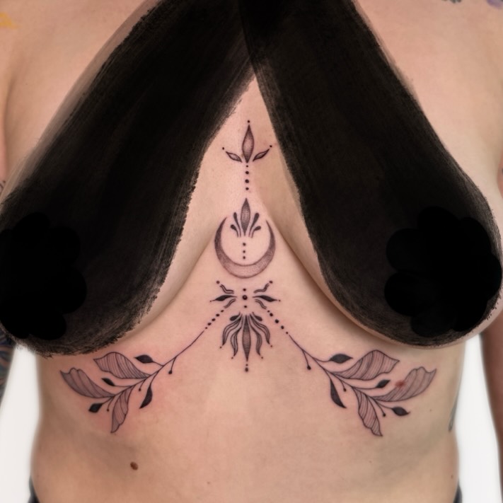 Floral and celestial motifs dotwork tattoo on the chest by Nika