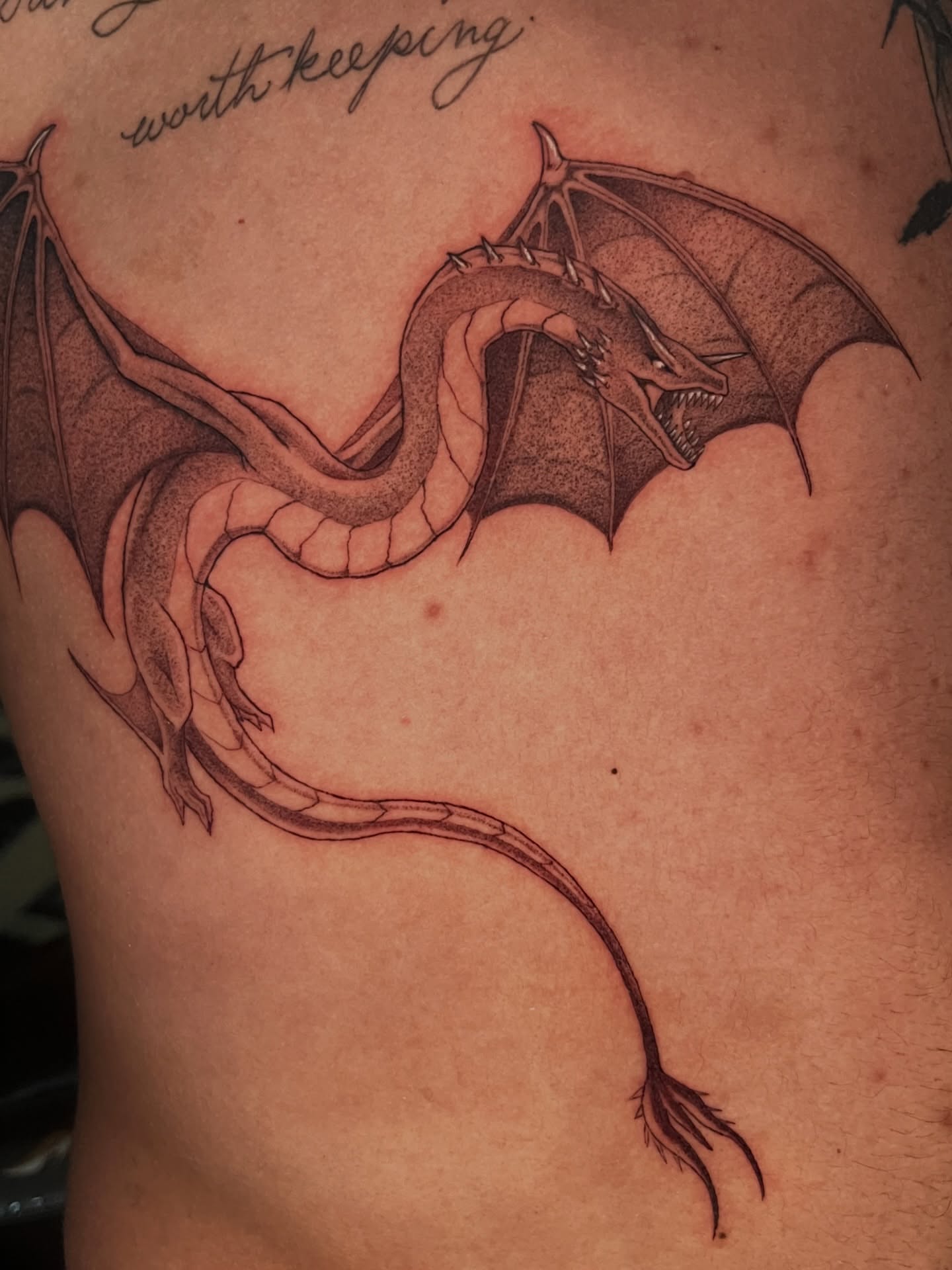 Dragon black and grey tattoo on the ribs by Odi ✮⋆˙, Las Vegas, Nevada