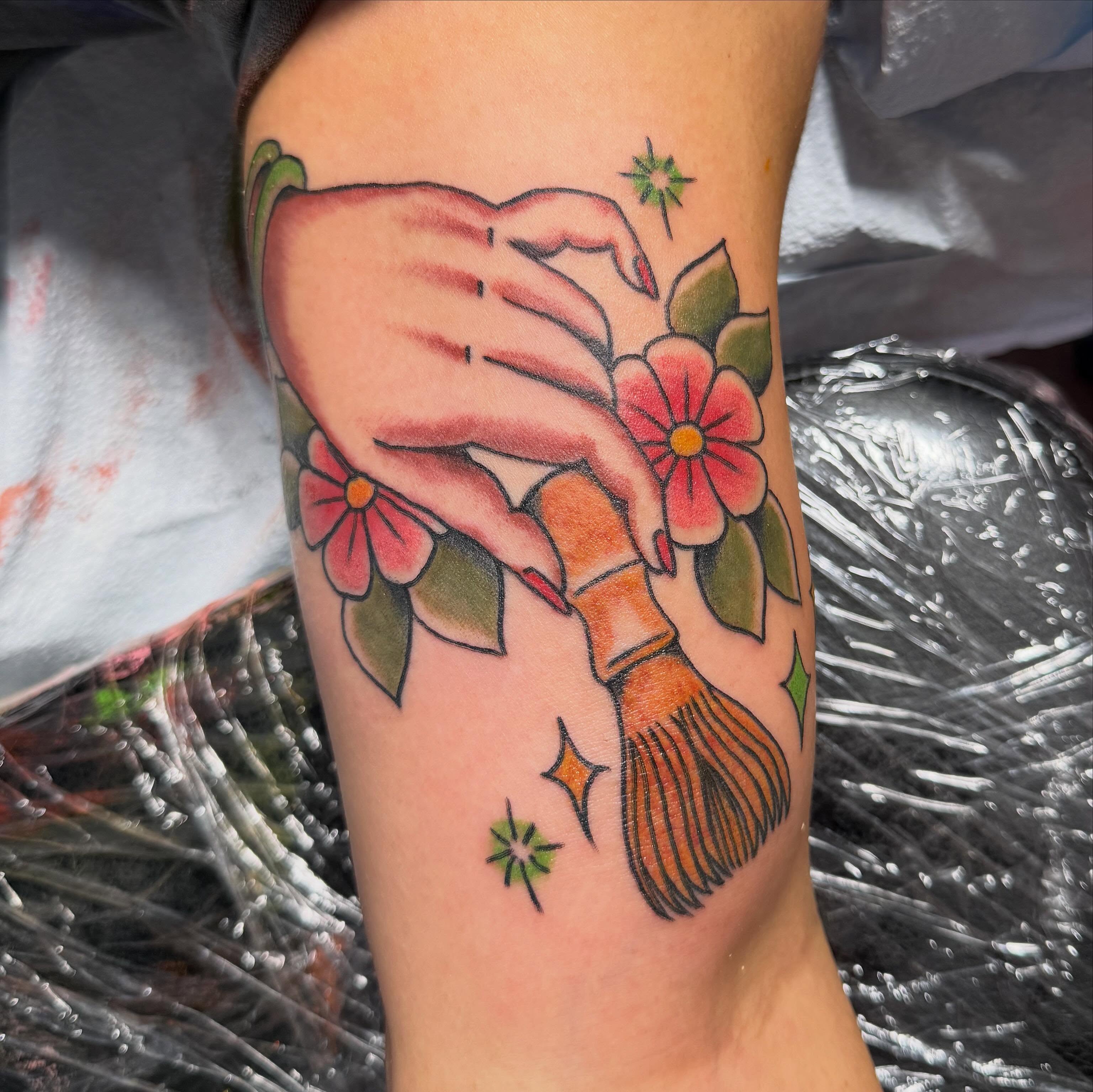 Brush and flowers American traditional tattoo on the forearm by Spencer Coco