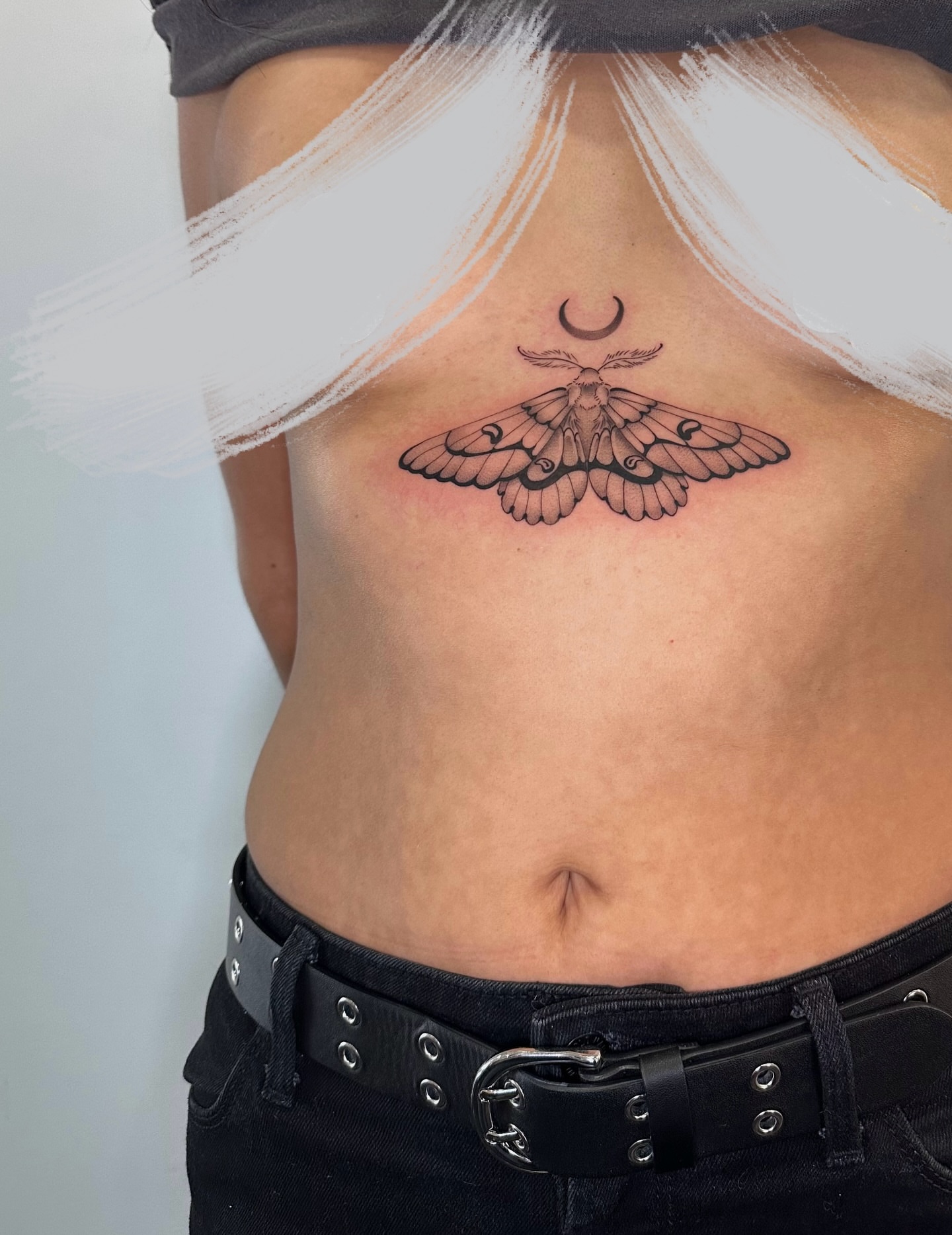 Moth black and grey tattoo on the torso by 𝘋𝘪𝘢𝘯𝘯𝘢