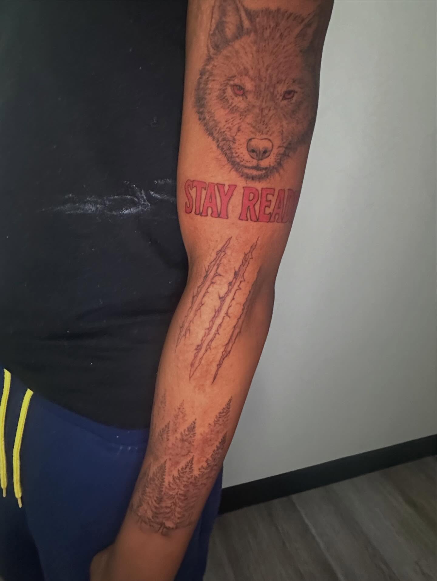 Wolf realism tattoo on the forearm by Javierr Jimenezz