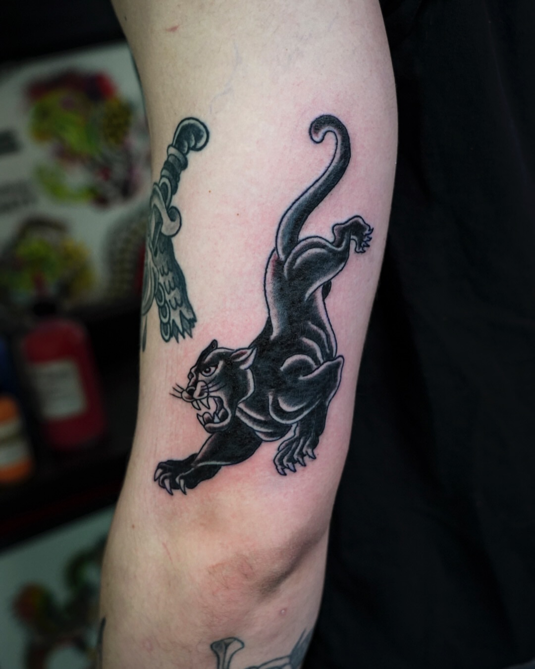 Panther American traditional tattoo on the forearm by Spicoli