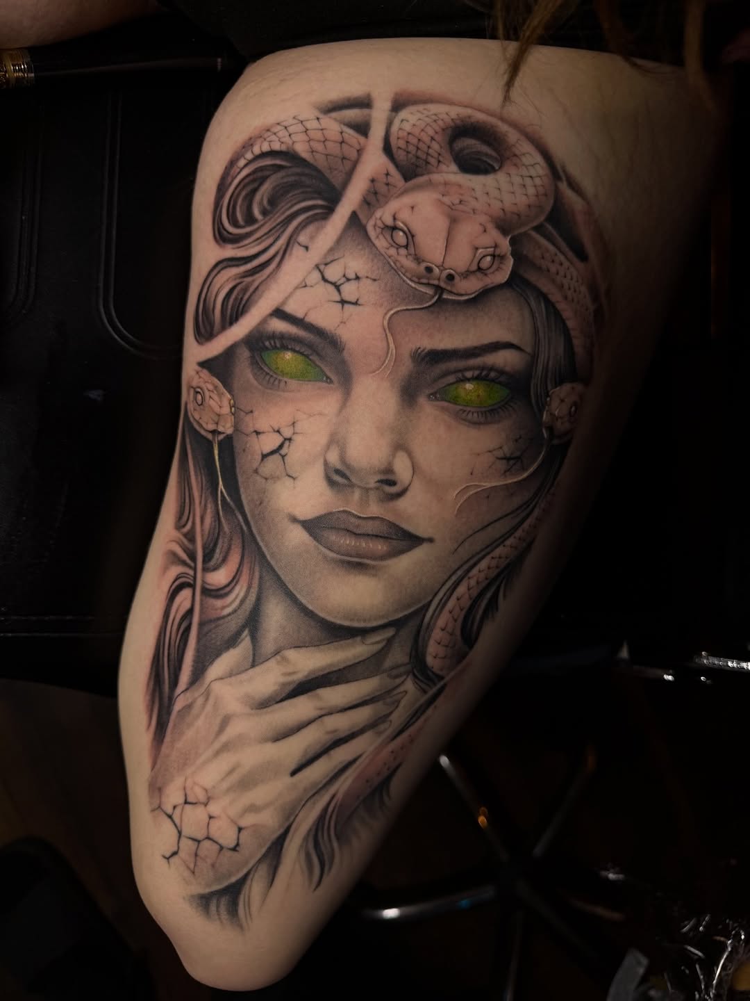 Medusa portrait with snakes realism tattoo on the thigh by Jevon Glasco Tattoos