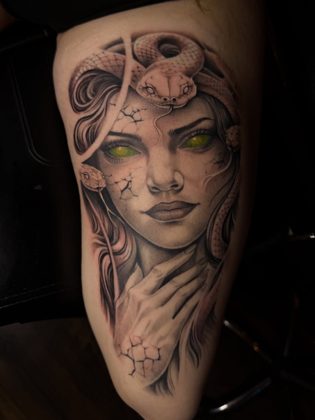 Medusa portrait with snakes realism tattoo on the thigh by Jevon Glasco Tattoos
