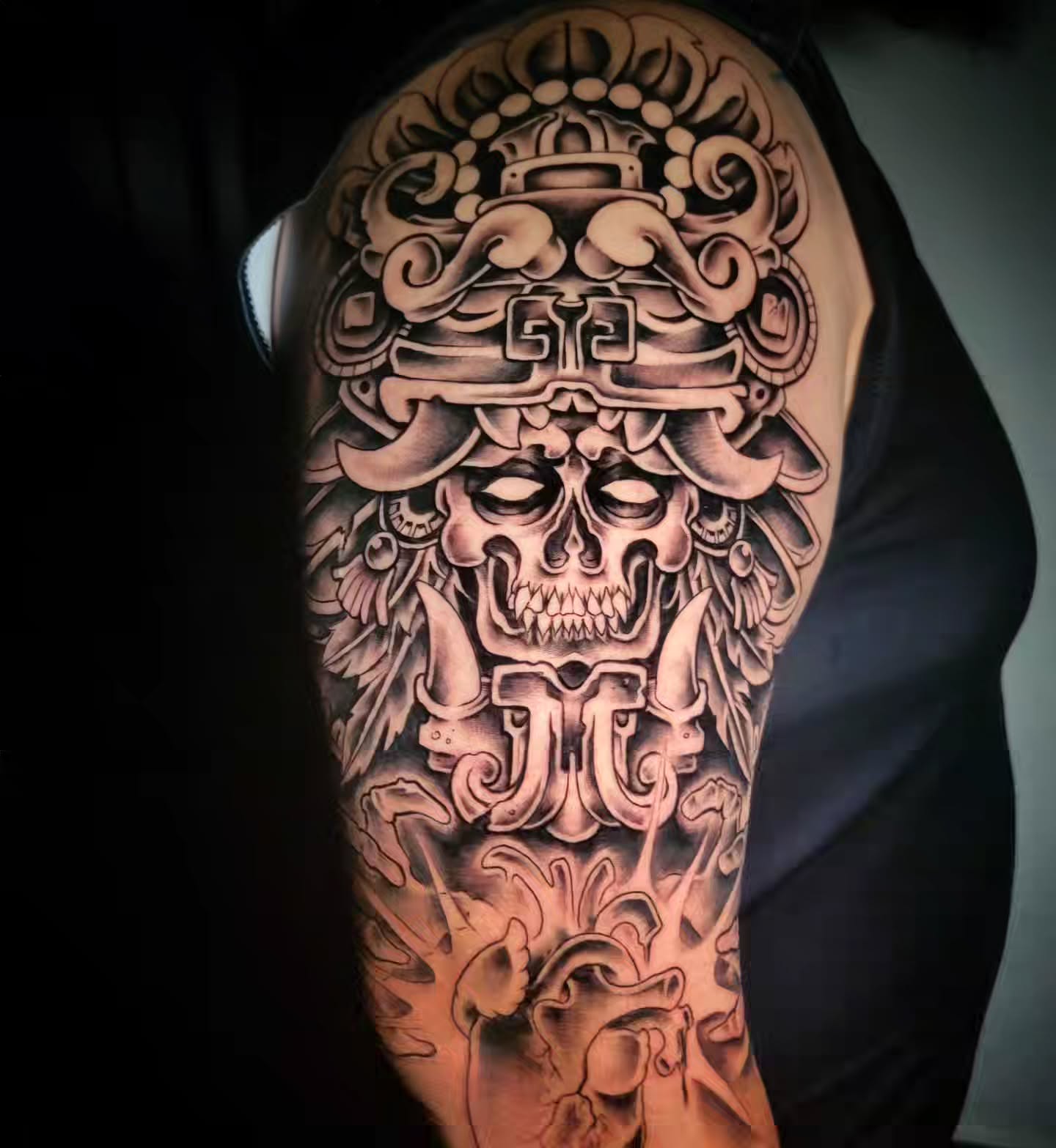Skull with ornate headdress geometric tattoo on the shoulder by Randyz Tattyz
