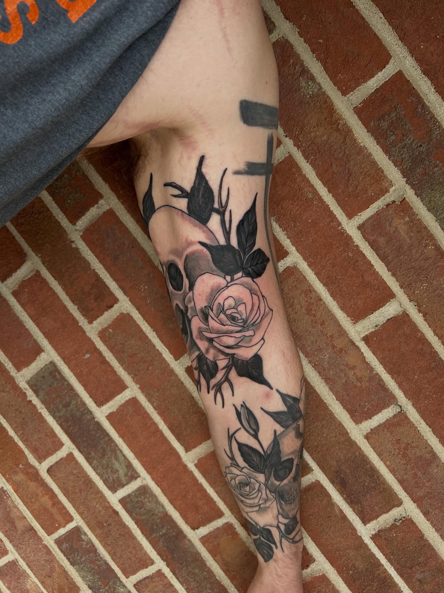 Rose and skull realism tattoo on the forearm by Shayna Soderstrom, Columbus, Ohio