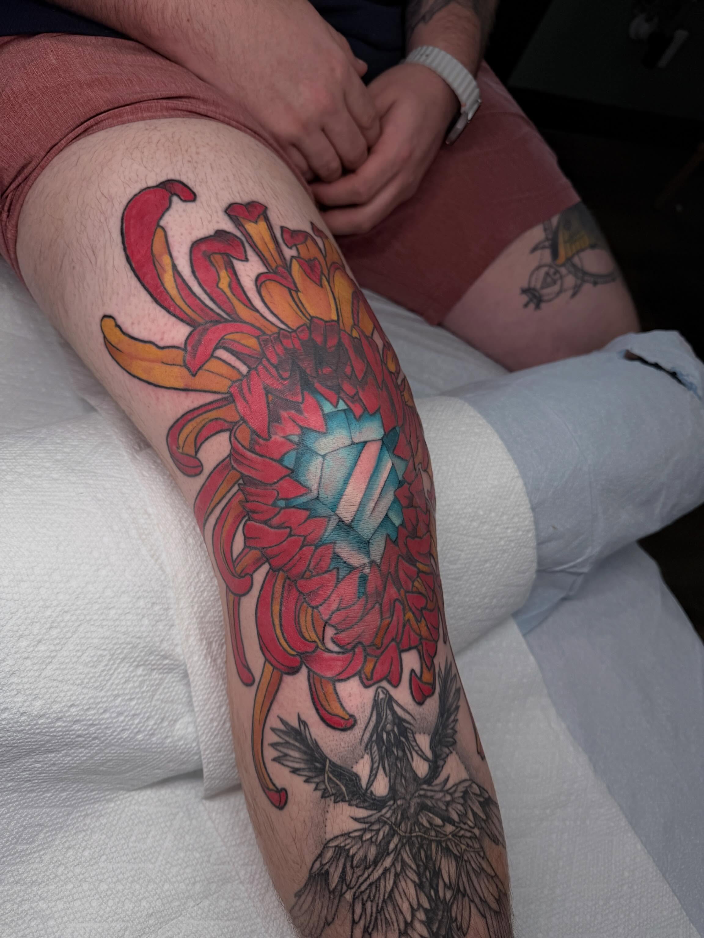 Chrysanthemum American traditional tattoo on the thigh by 🦋ｊｅｓｓｉｃａ  f  o  x🦋, Nashville, Tennessee