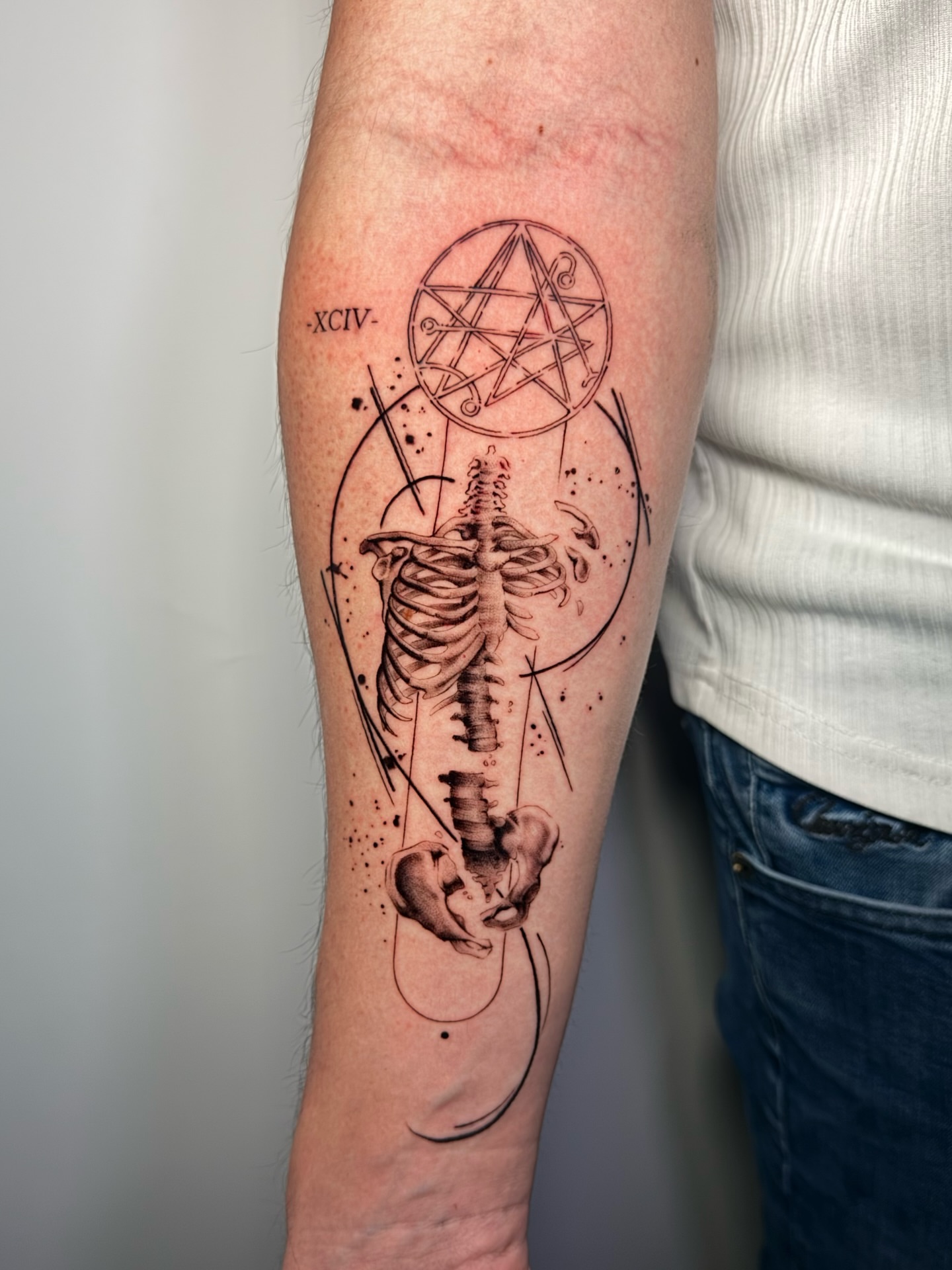 Skeleton black and grey tattoo on the forearm by Moi Rivas, Salt Lake City, Utah