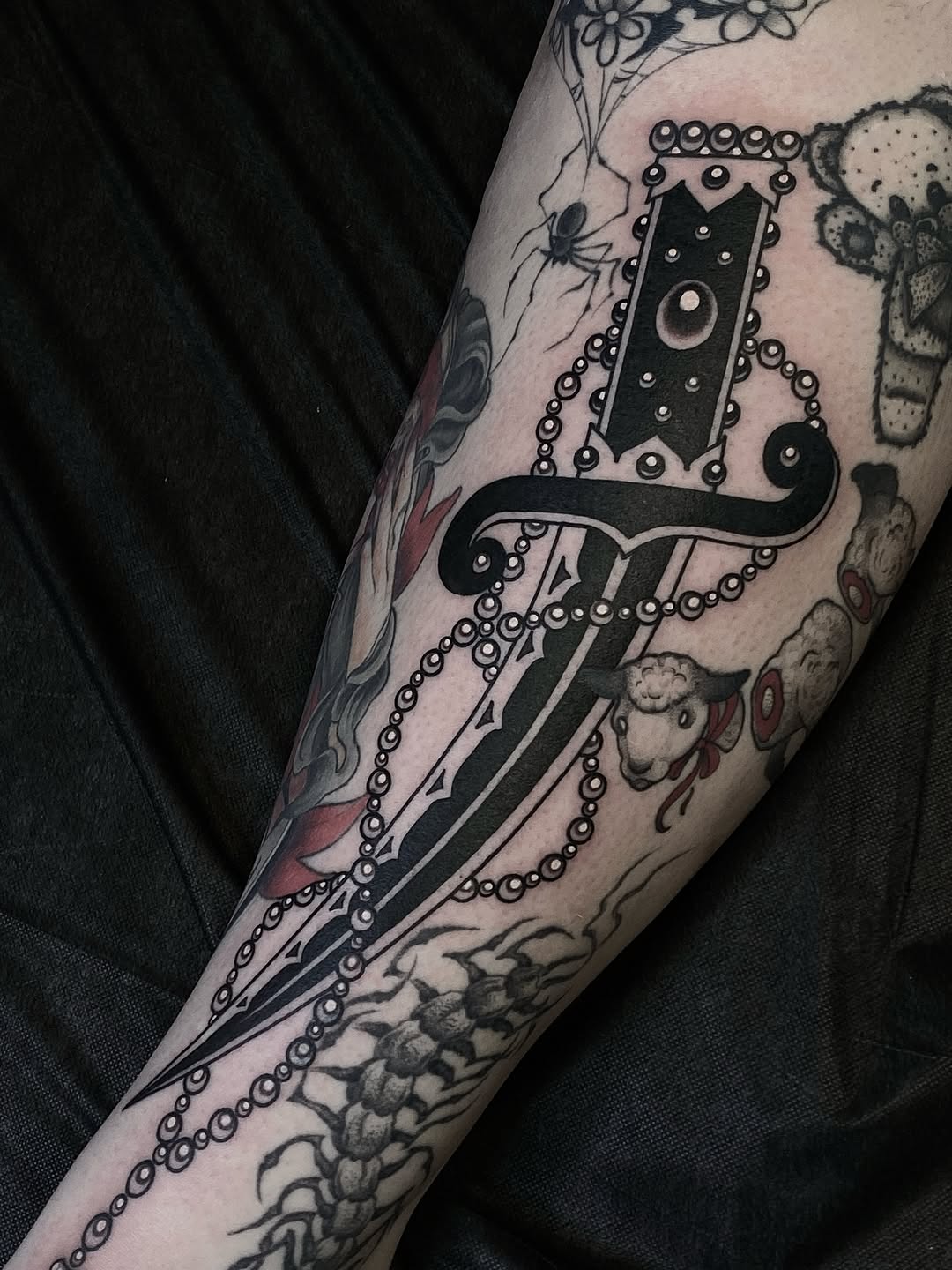 Tattoo by @black_casket — american_traditional, blackwork