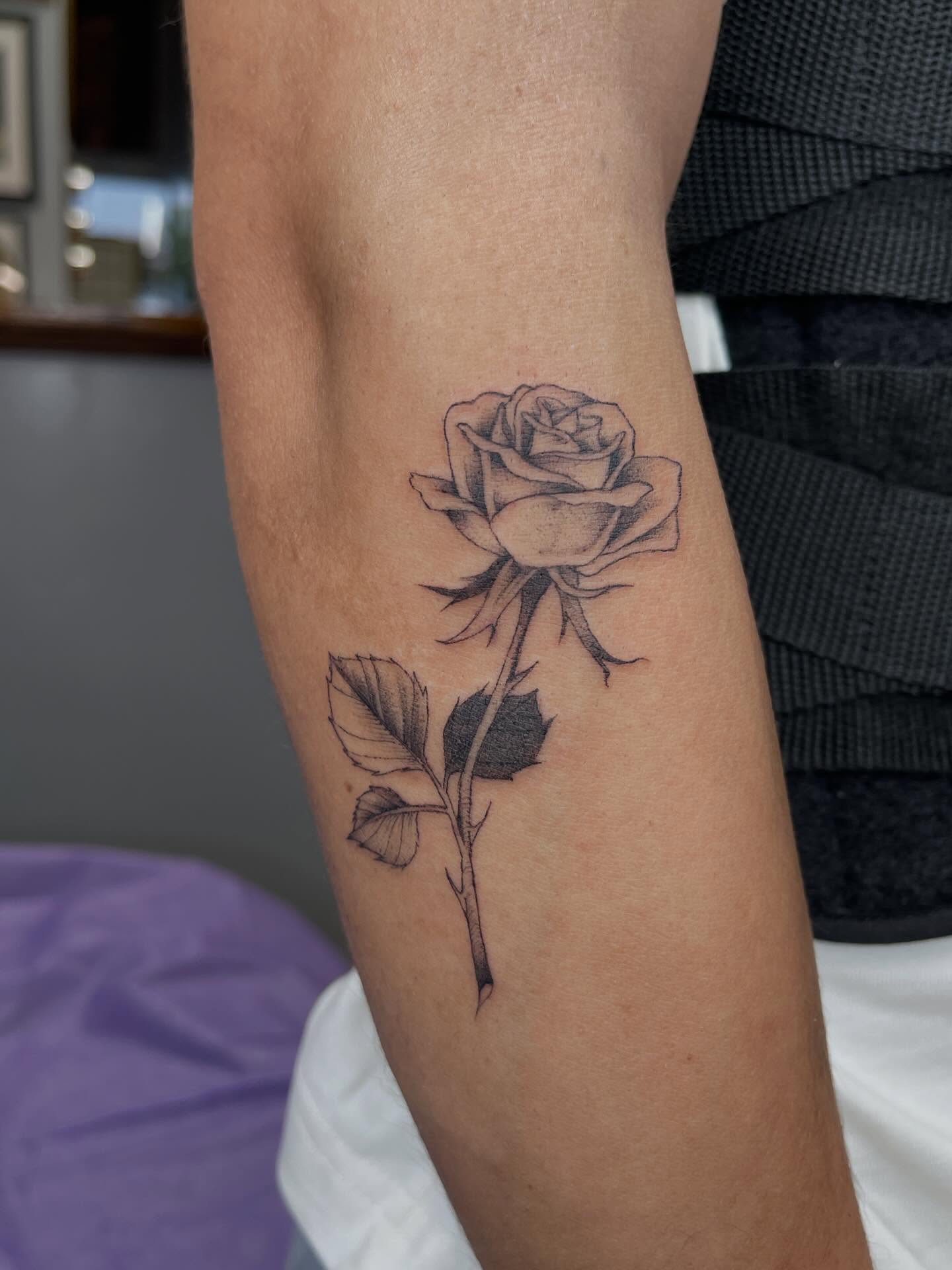 Rose black and grey tattoo on the forearm by cindy ha soul son
