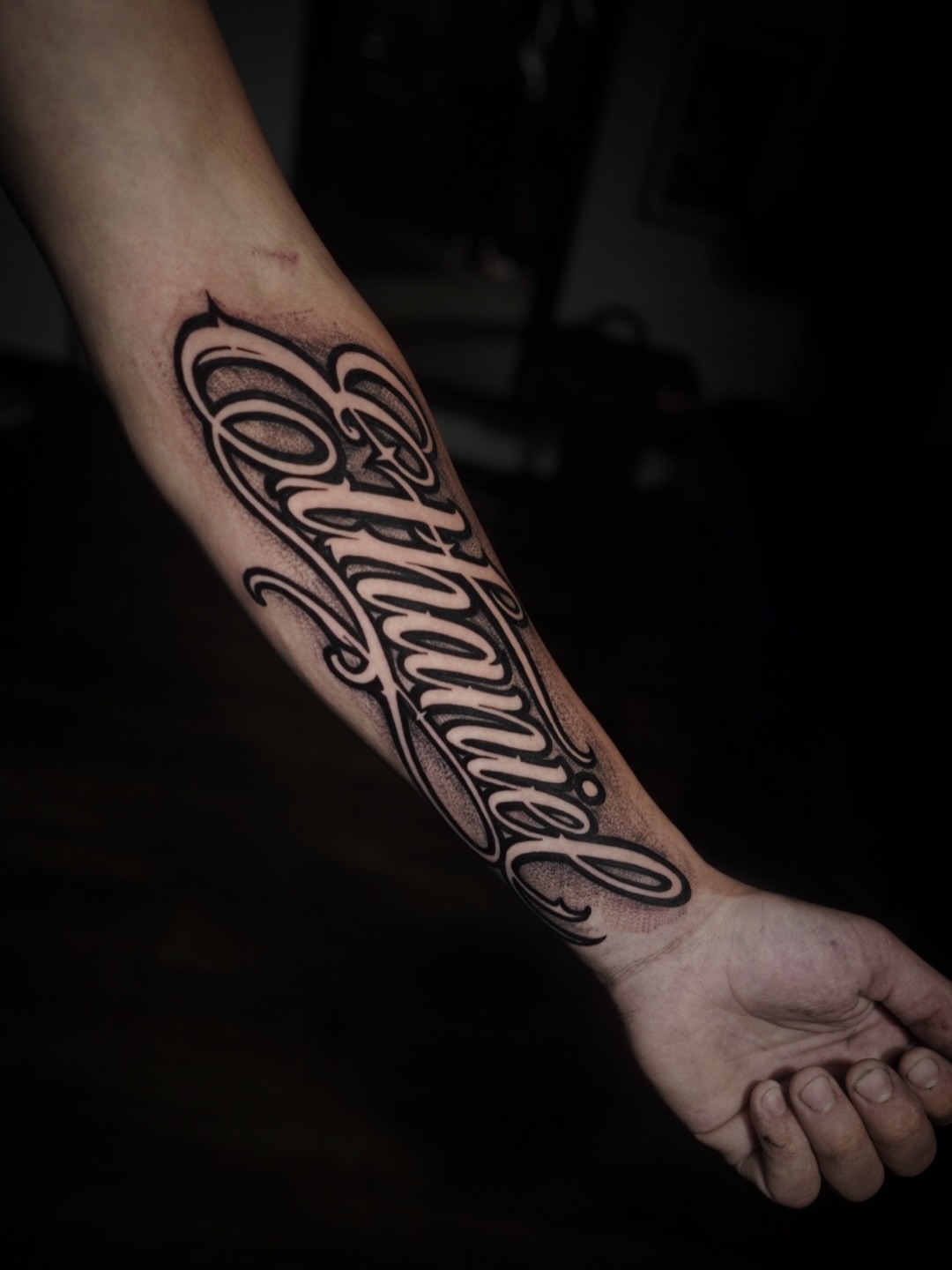 Script lettering lettering script tattoo on the forearm by Niko Hosk Cataldo