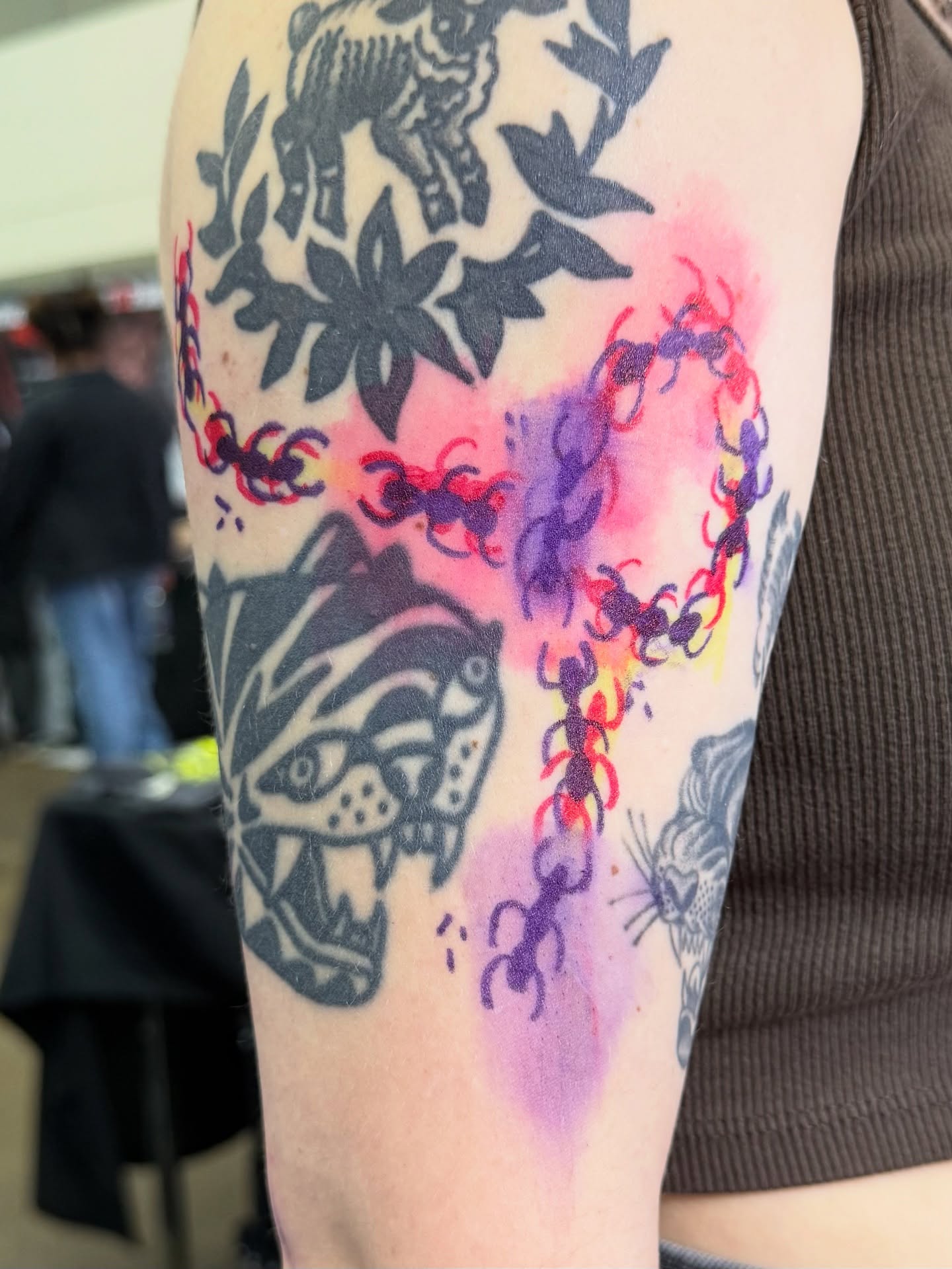 Tiger and abstract American traditional tattoo on the forearm by Roman