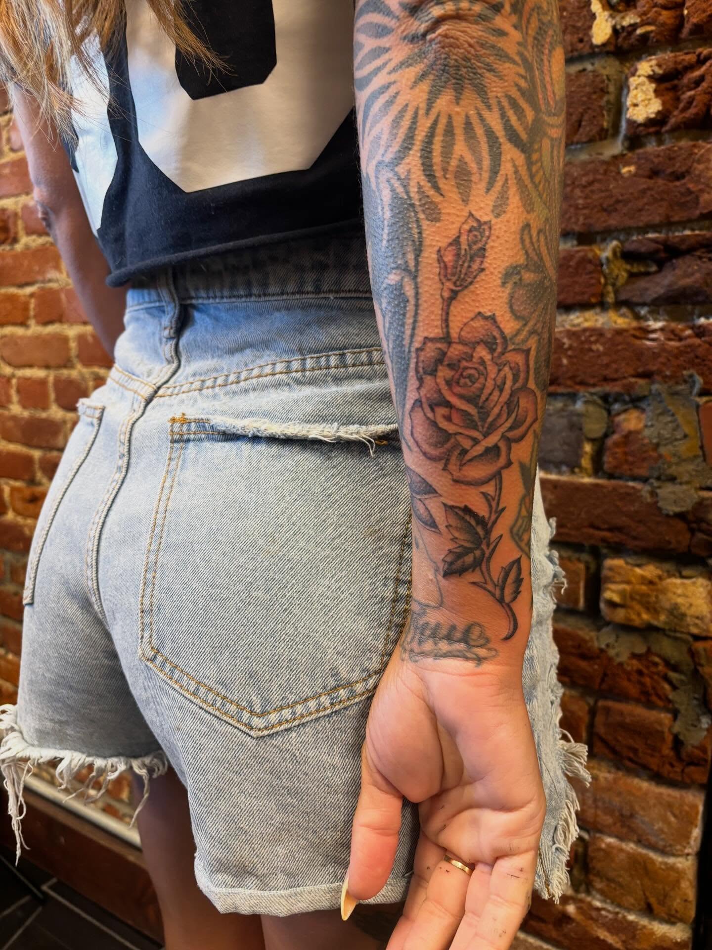 Rose black and grey tattoo on the forearm by Alyssa L'Heureux🕴🏼, Los Angeles, California