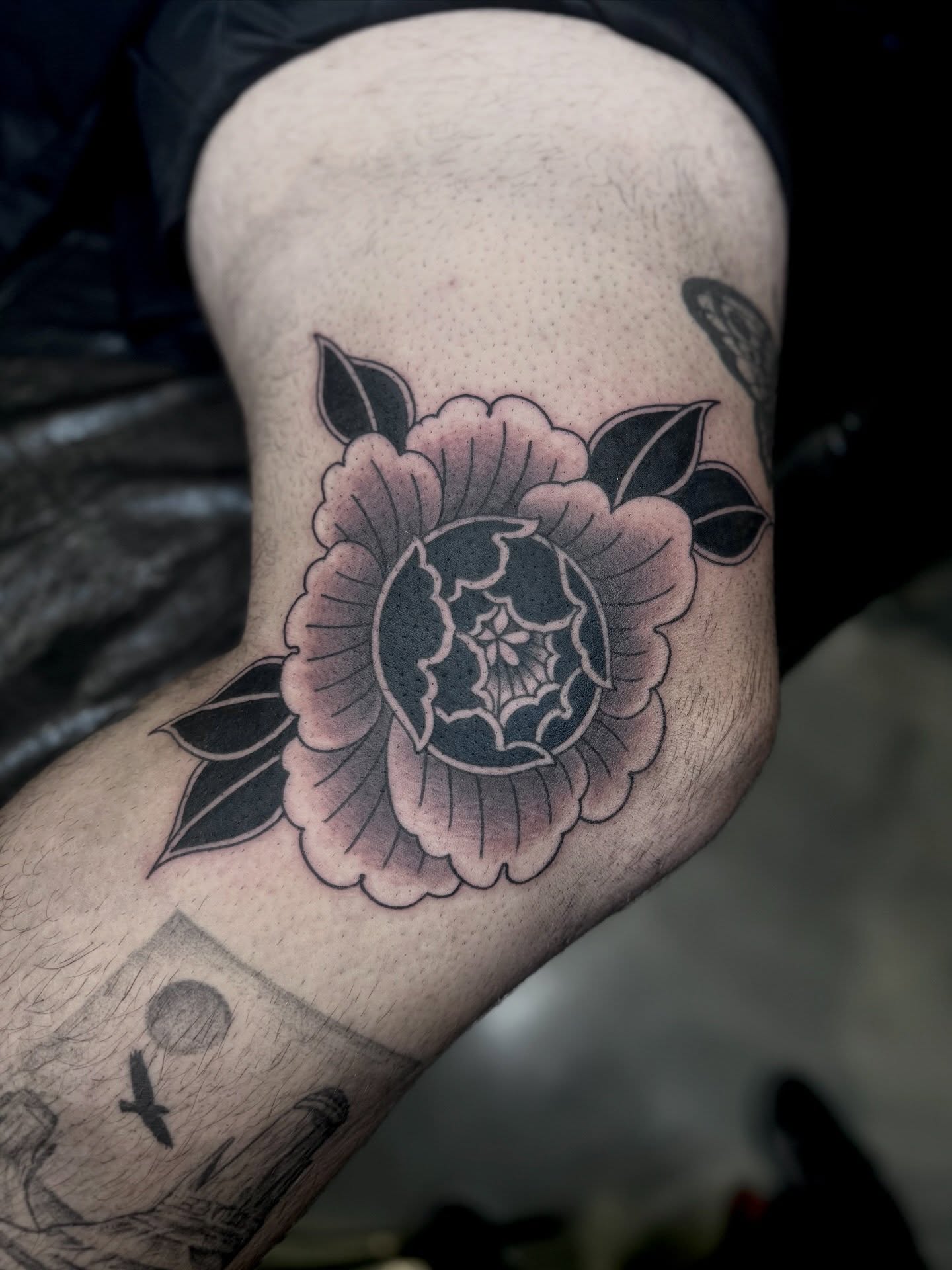 Peony flower American traditional tattoo on the thigh by ♡ Erika Soya ♡