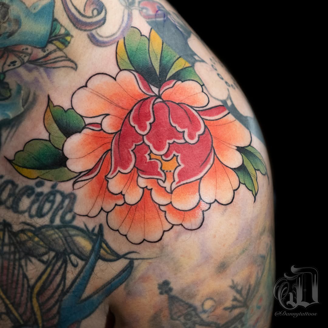 Peony flower American traditional tattoo on the shoulder by Danny Pando