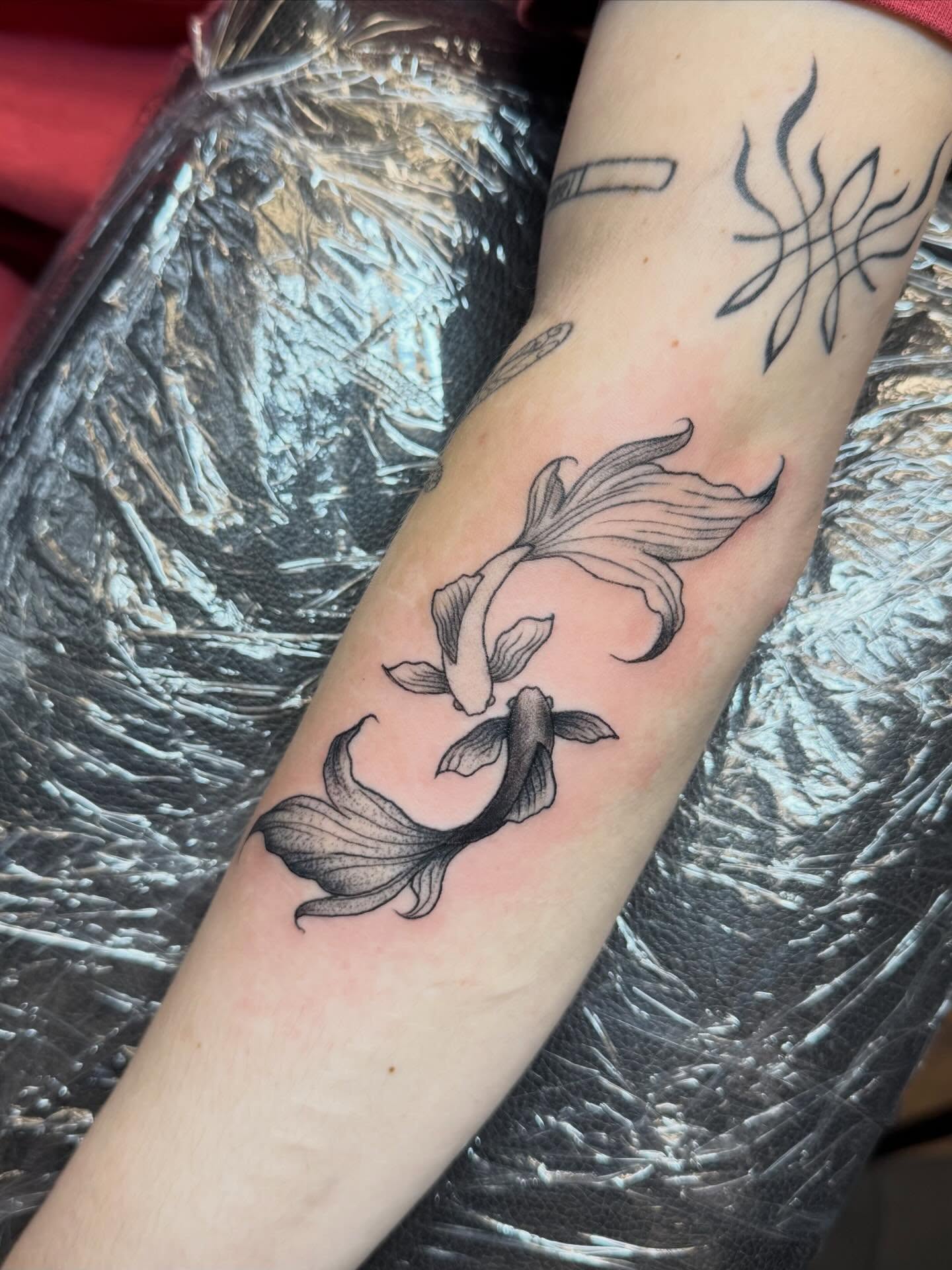 Goldfish black and grey tattoo on the forearm by Bri ⚡️✨