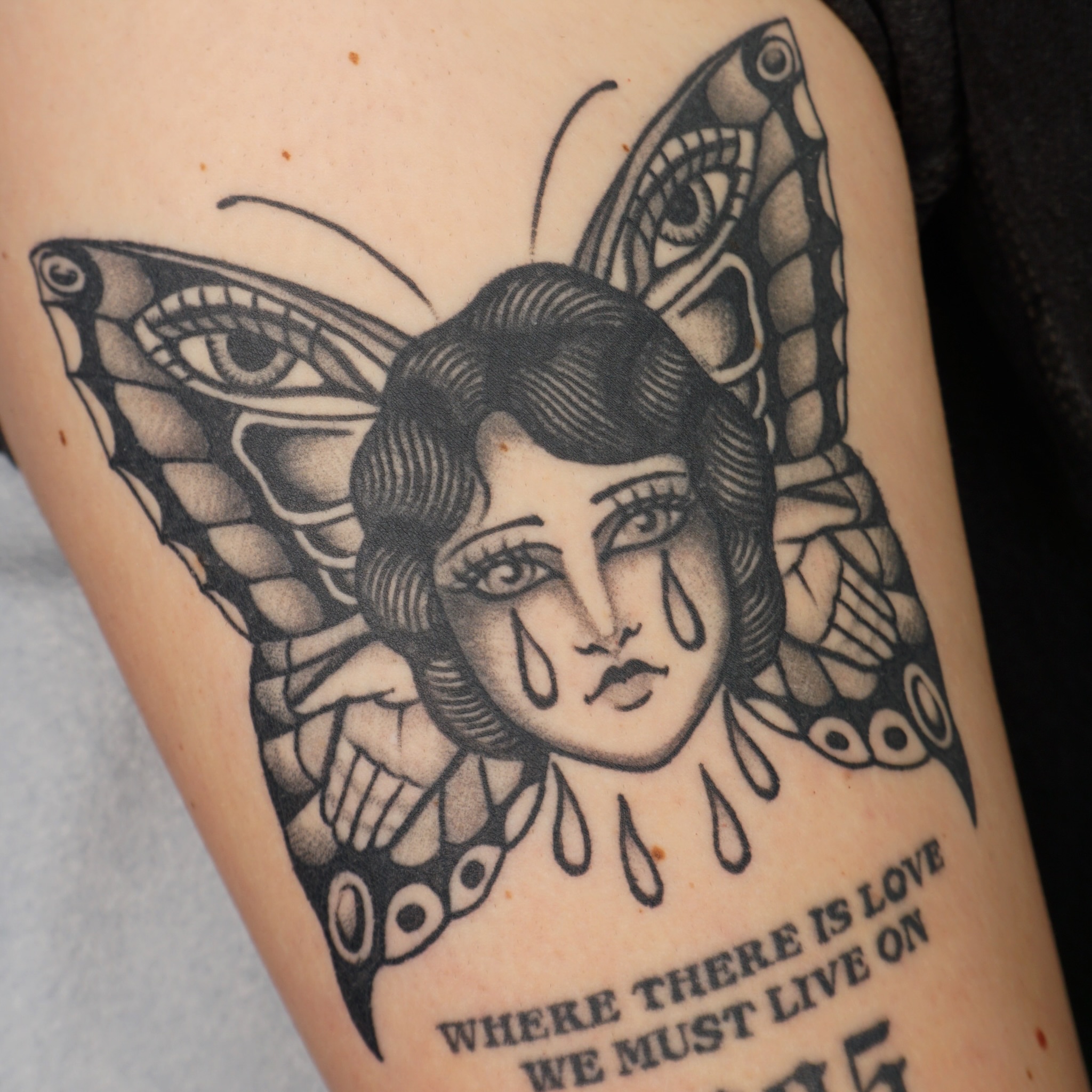 Woman with butterfly wings realism tattoo on the forearm by Sarah Christine Tattoo, Calgary, Alberta