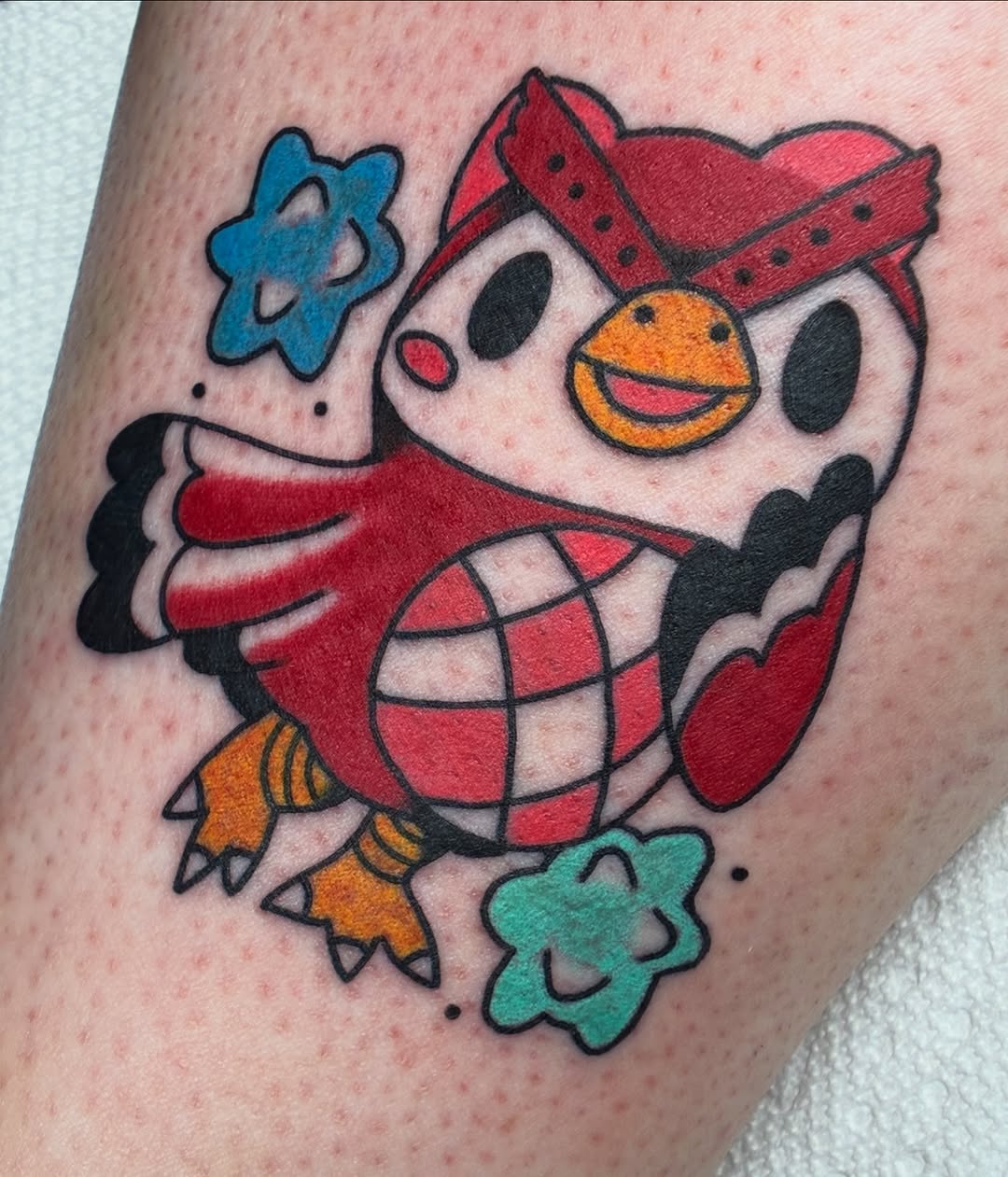 Owl character with stars new school tattoo on the thigh by Sav Robinson