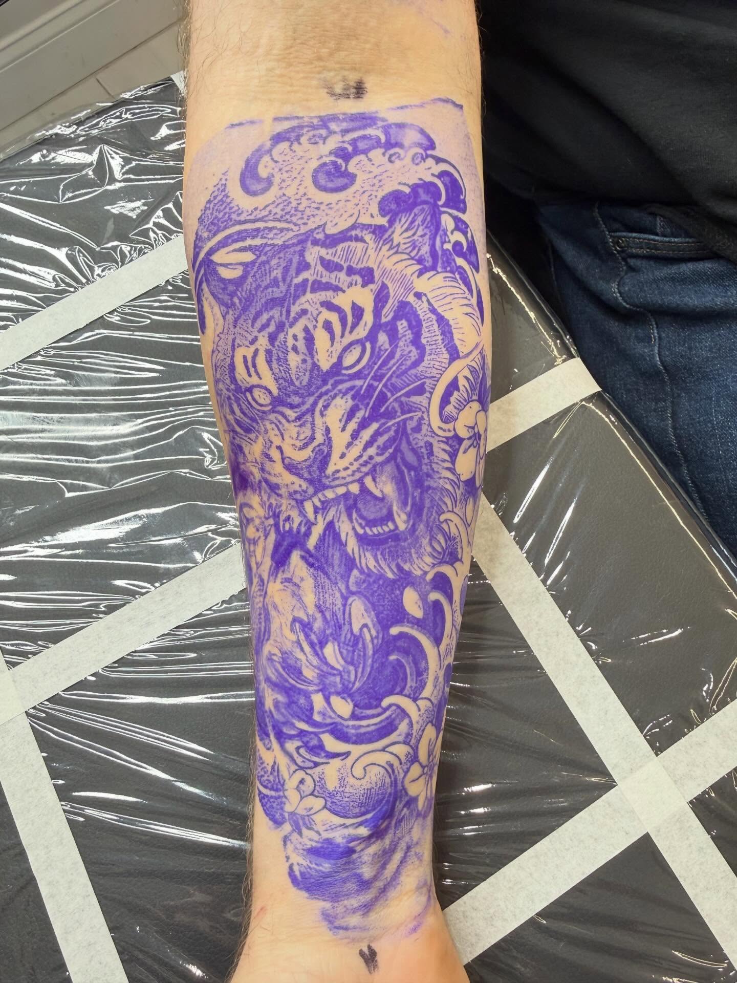 Tiger and floral japanese irezumi tattoo on the calf by Kai, Charlotte, North Carolina
