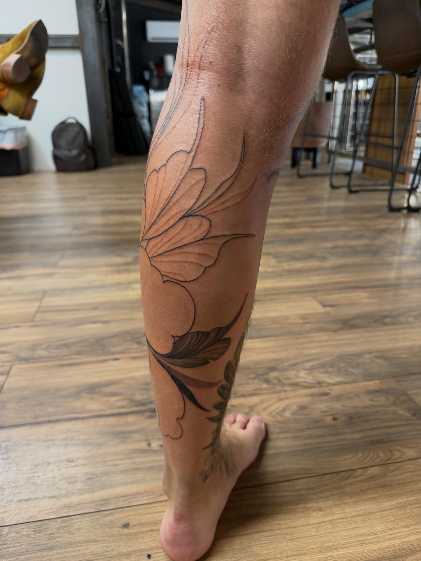 Flower black and grey tattoo on the calf by πππππ βππ£π£ππ€ππ , Tucson, Arizona