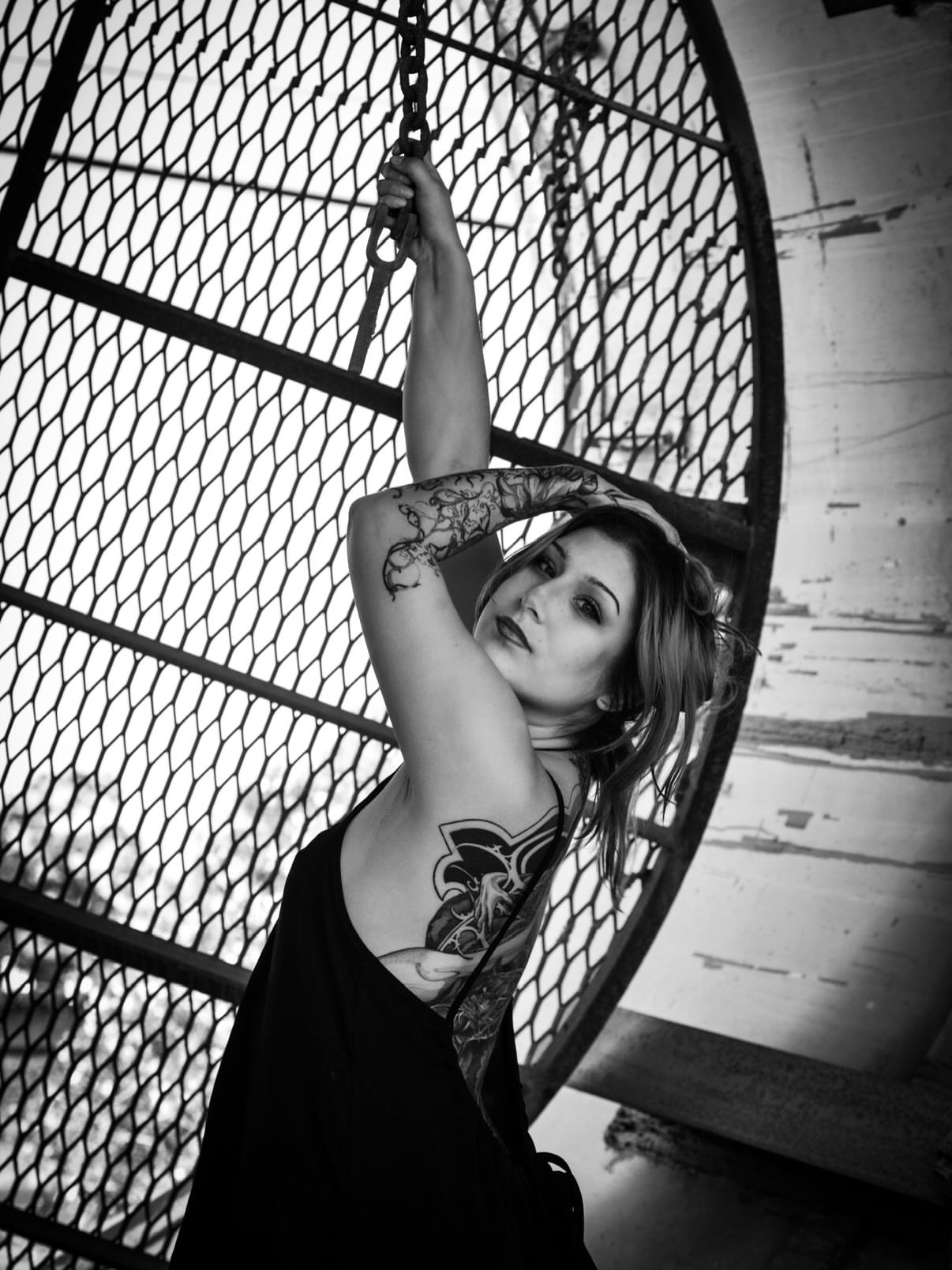 Floral design black and grey tattoo on the upper arm by Isabella π€