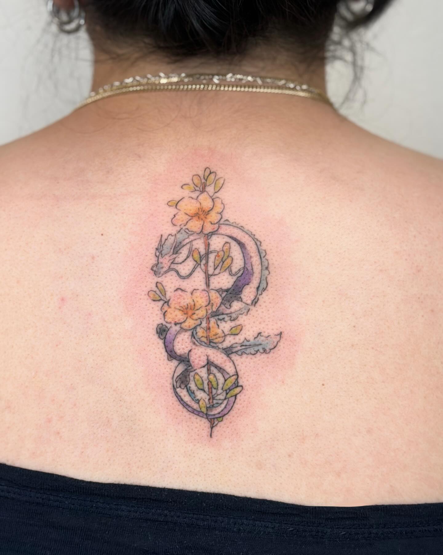 Tattoo by @lily_licious_ink — dotwork