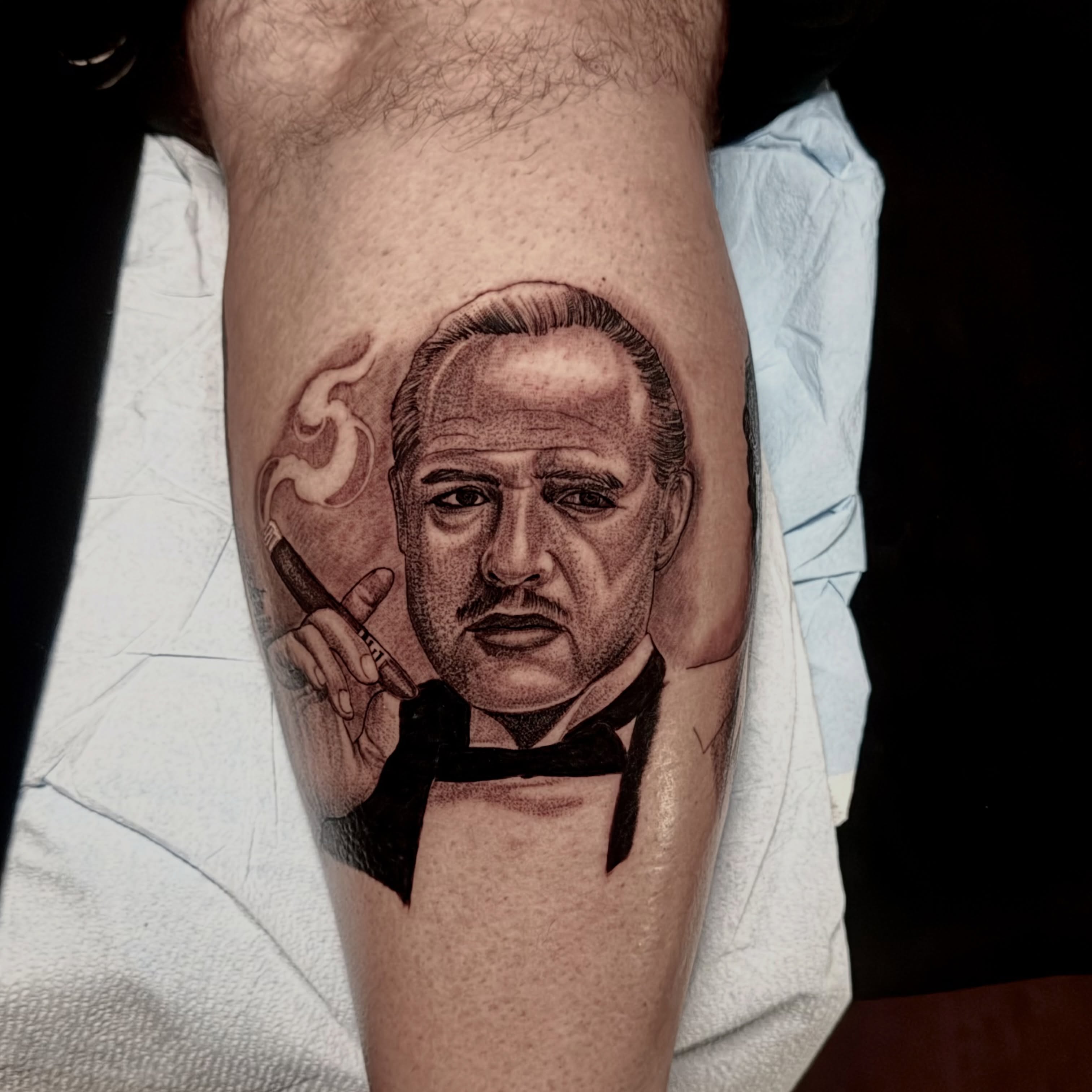 Don vito corleone realism tattoo on the forearm by Tattoo Artist