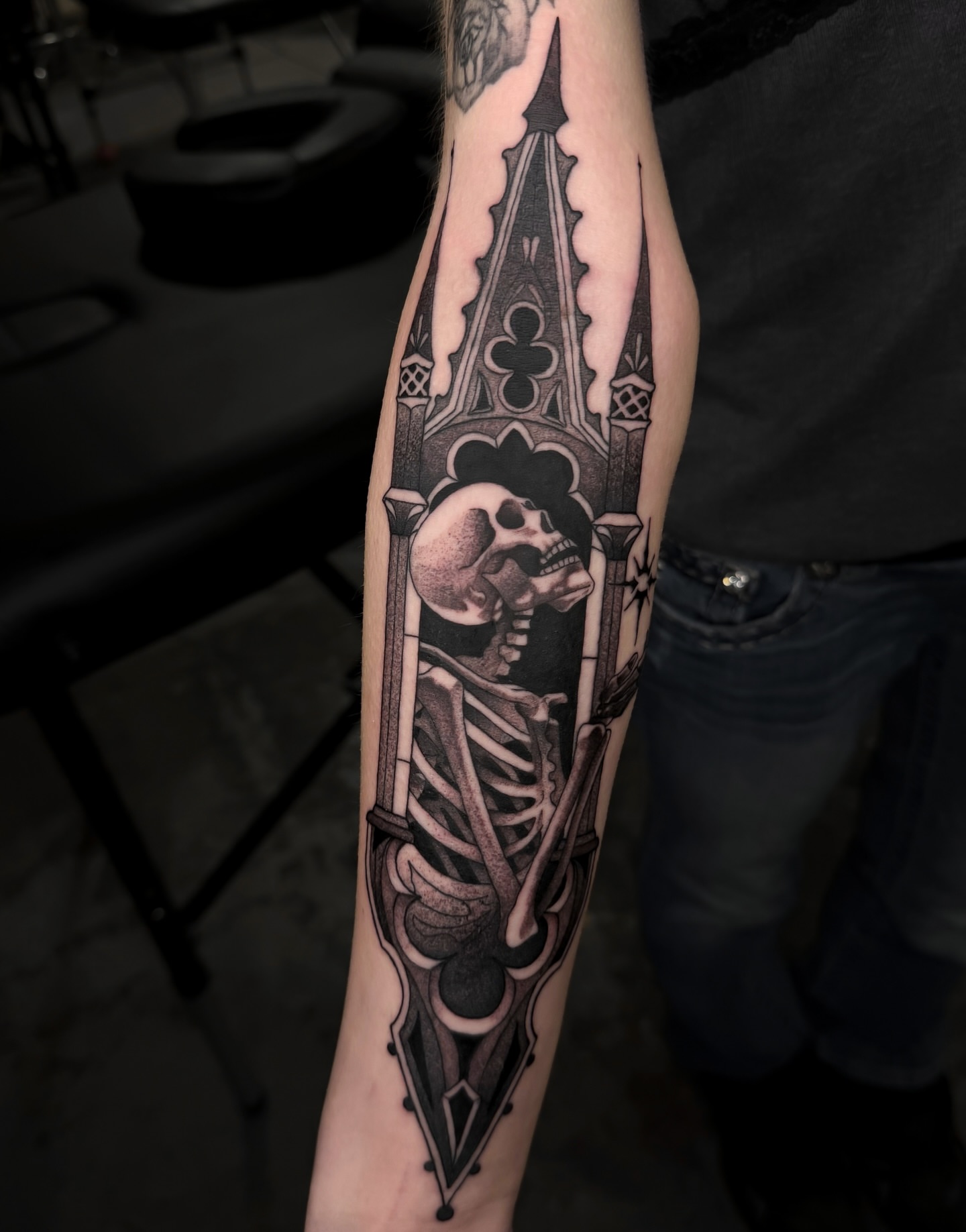 Skeleton in gothic arch realism tattoo on the forearm by Hades cabrera, Richmond, Virginia