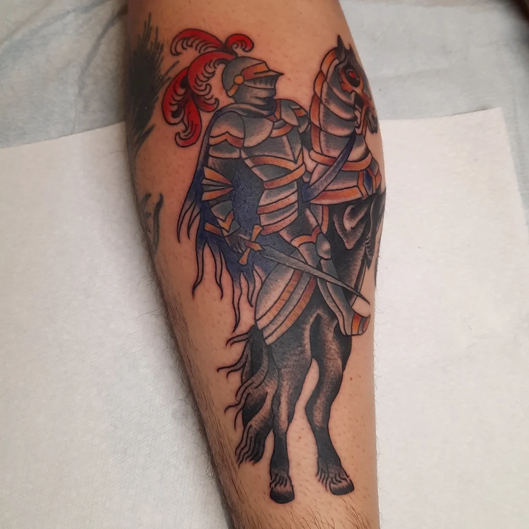 Knight on horseback black and grey tattoo on the calf by Kaetlyn