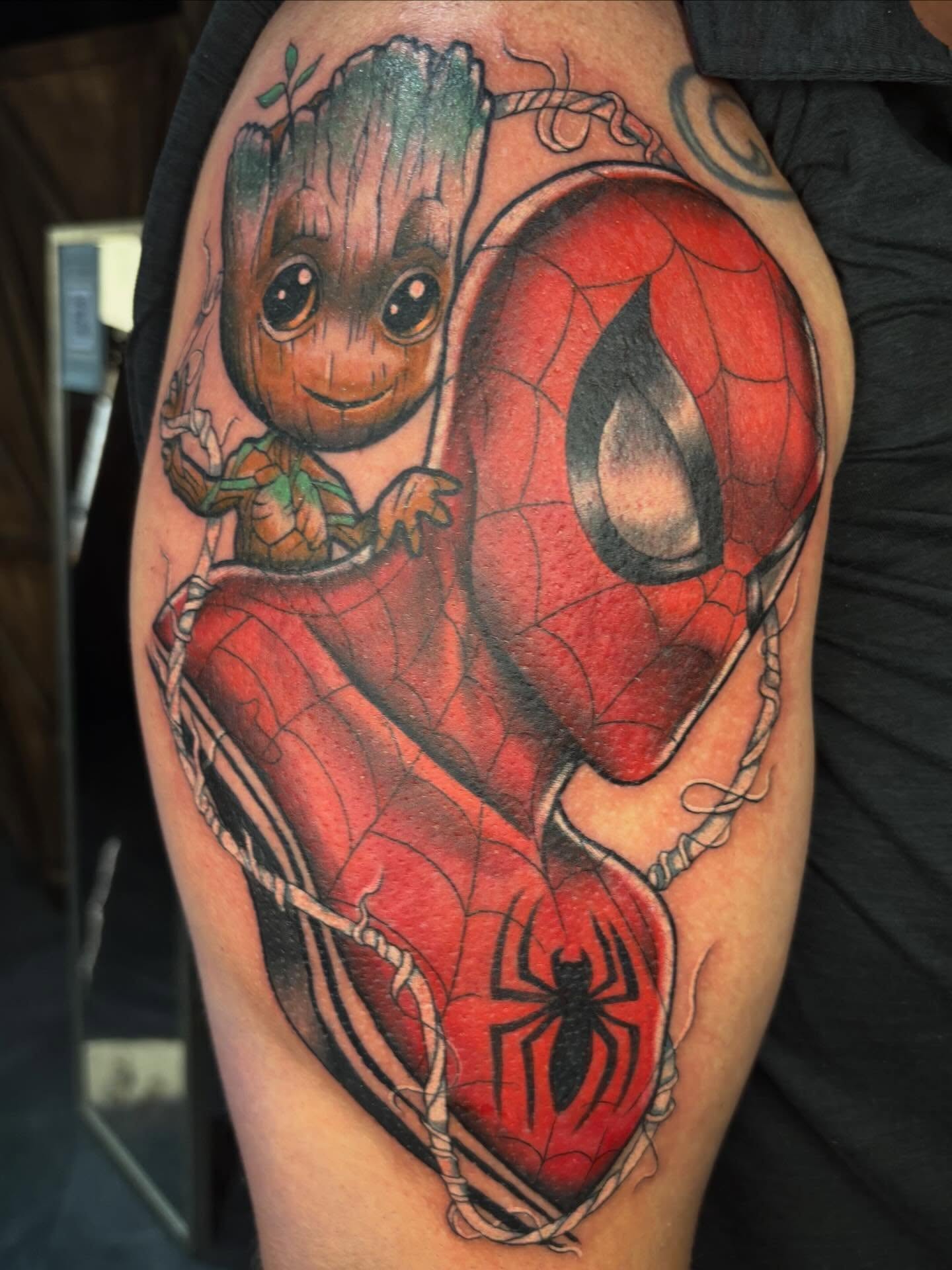 Groot and Spider-Man realism tattoo on the forearm by Alex Green, Nashville, Tennessee