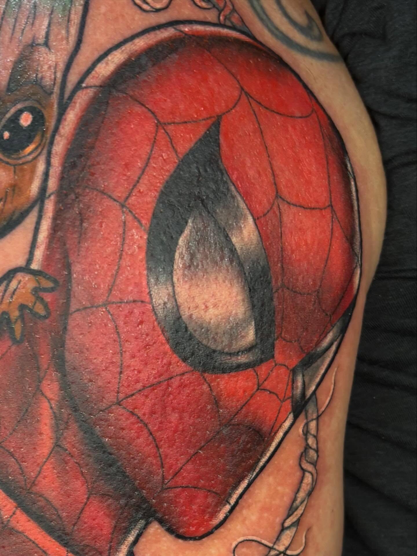 Spiderman mask realism tattoo on the shoulder by Alex Green, Nashville, Tennessee