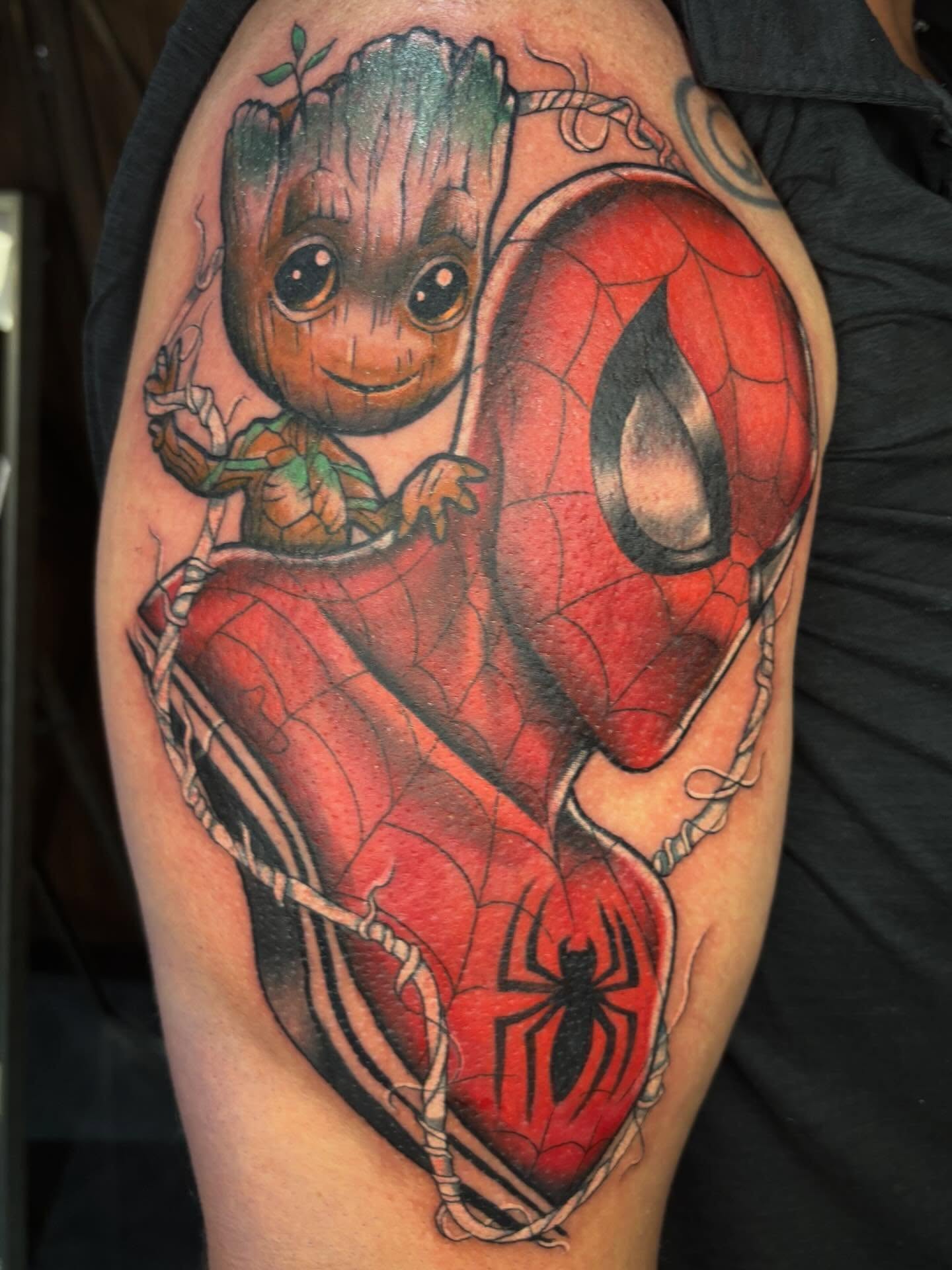 Groot and Spider-Man realism tattoo on the forearm by Alex Green, Nashville, Tennessee