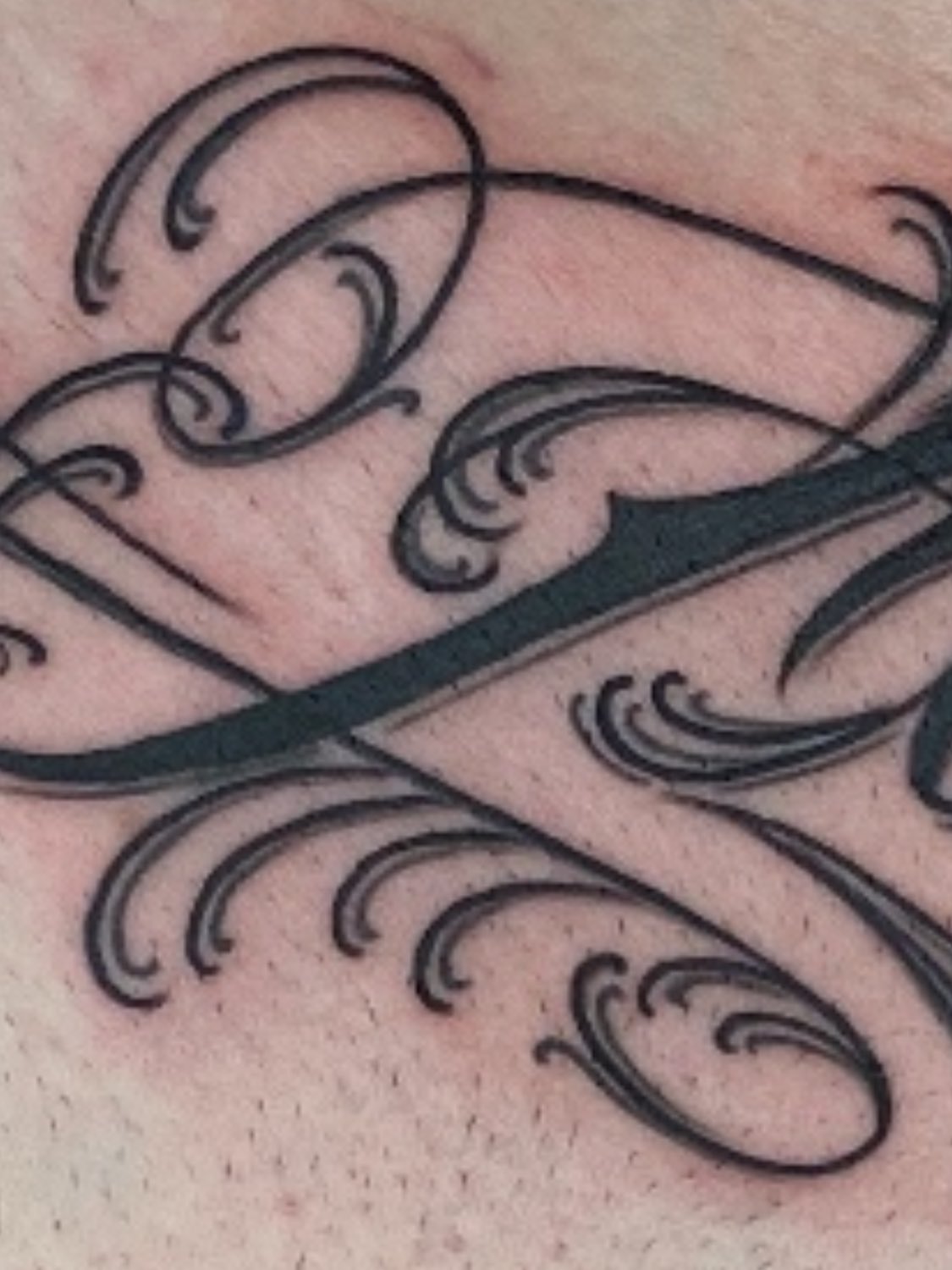 Swirls black and grey tattoo by Kelan Mckenna