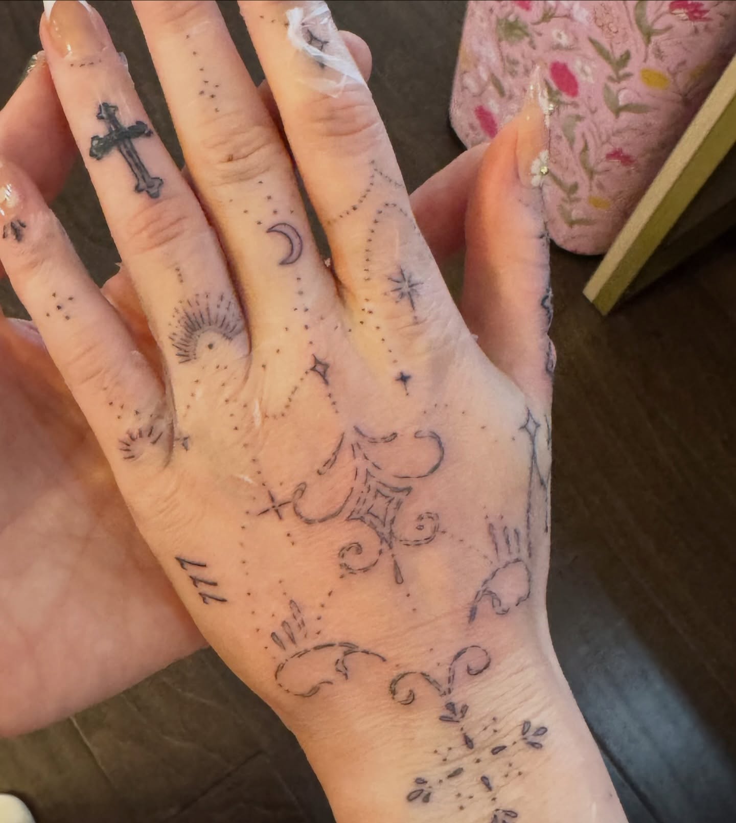 Religious symbols dotwork tattoo on the hand by fine line tattoo artist▪️Austin TX