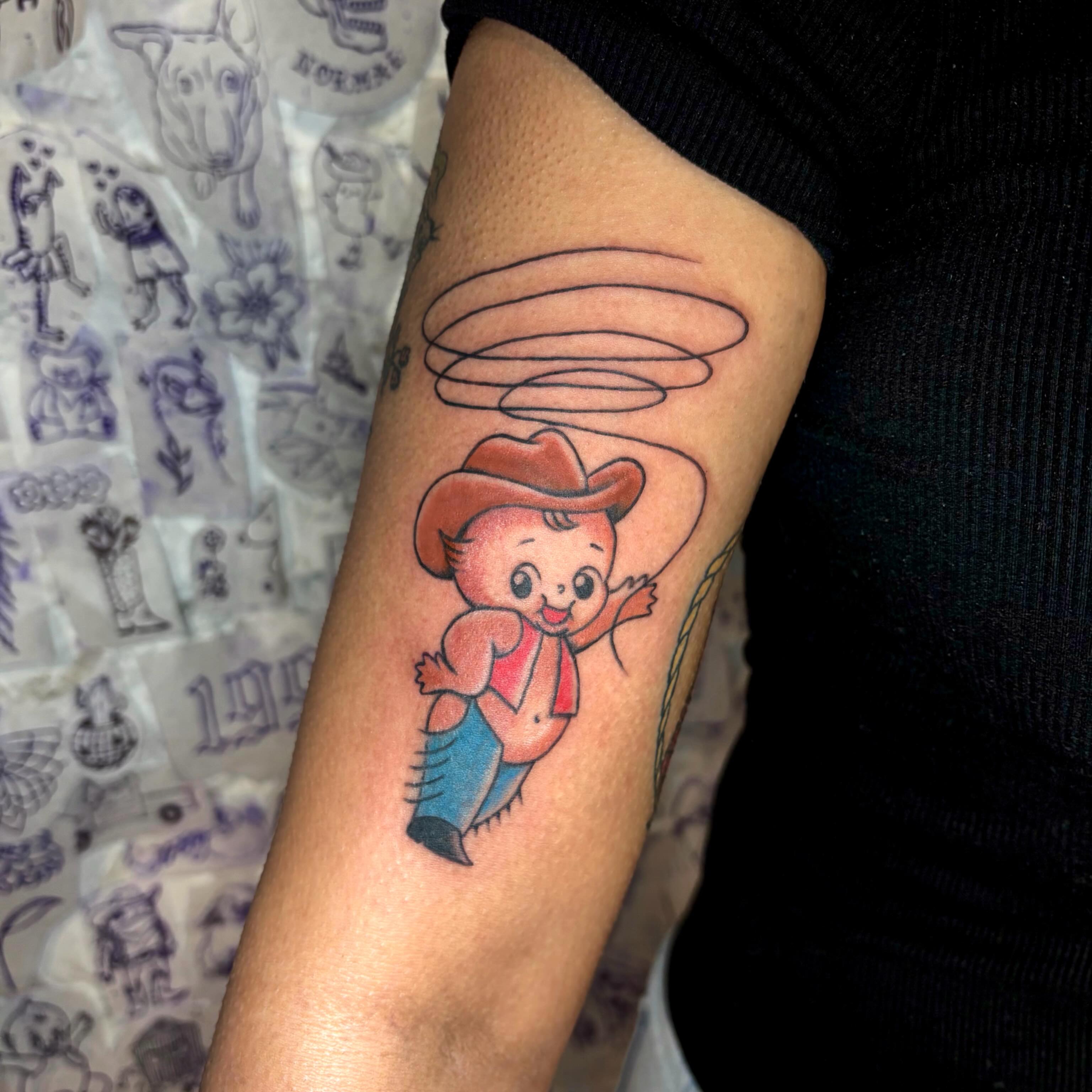Cowboy baby American traditional tattoo on the forearm by Danelle ✶ Nashville Tattooer