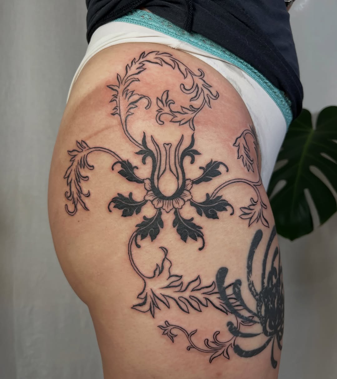 Ornamental floral pattern ornamental tattoo on the thigh by lela