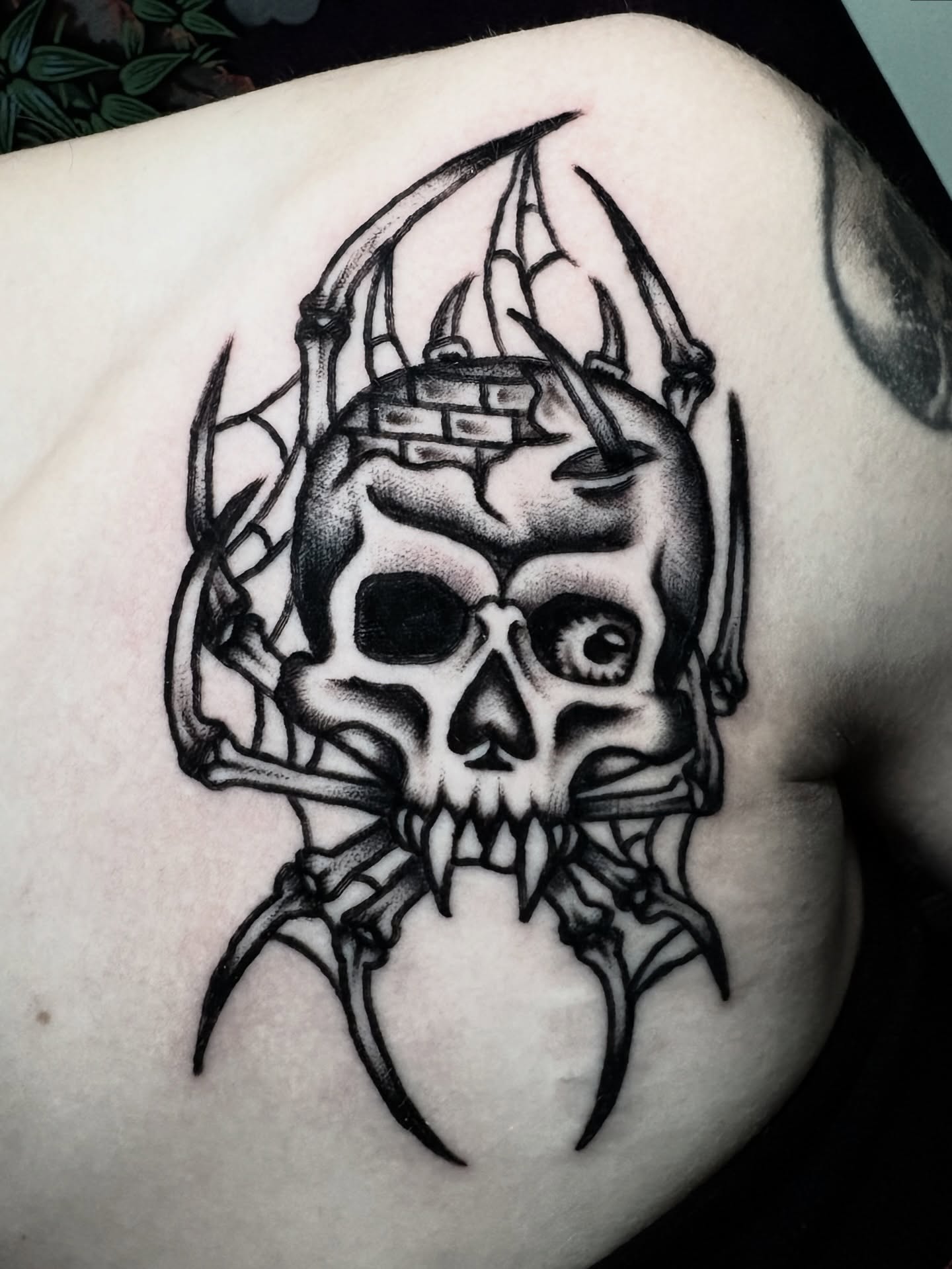 Skull with scythe black and grey tattoo on the shoulder by π³πππ πΆπππππ