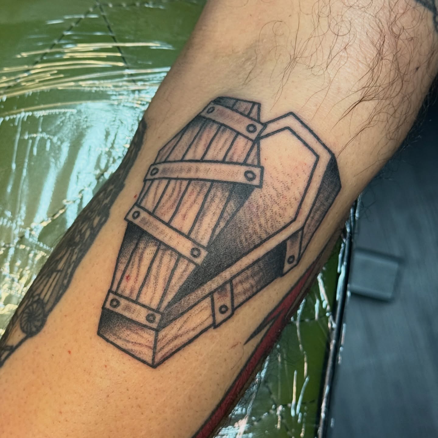 Wooden barrel black and grey tattoo on the forearm by Traddy Maddie ๐