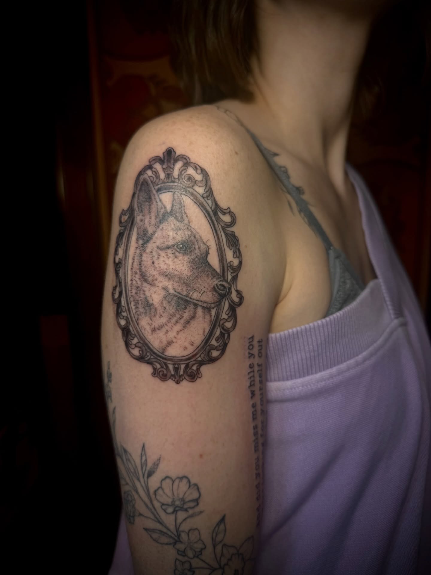 Dog portrait realism tattoo on the shoulder by Kylie Allen