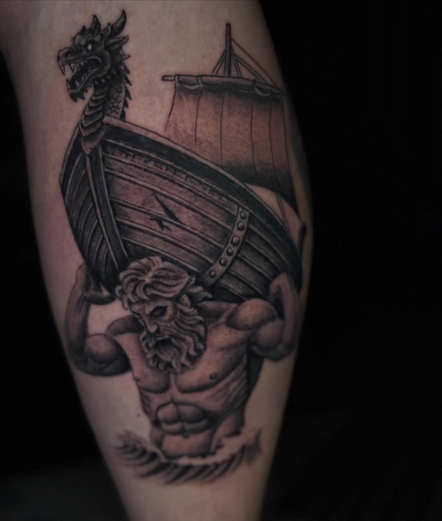God-like figure with ship realism tattoo on the forearm by Jacob Bettker, Centerville, Ohio